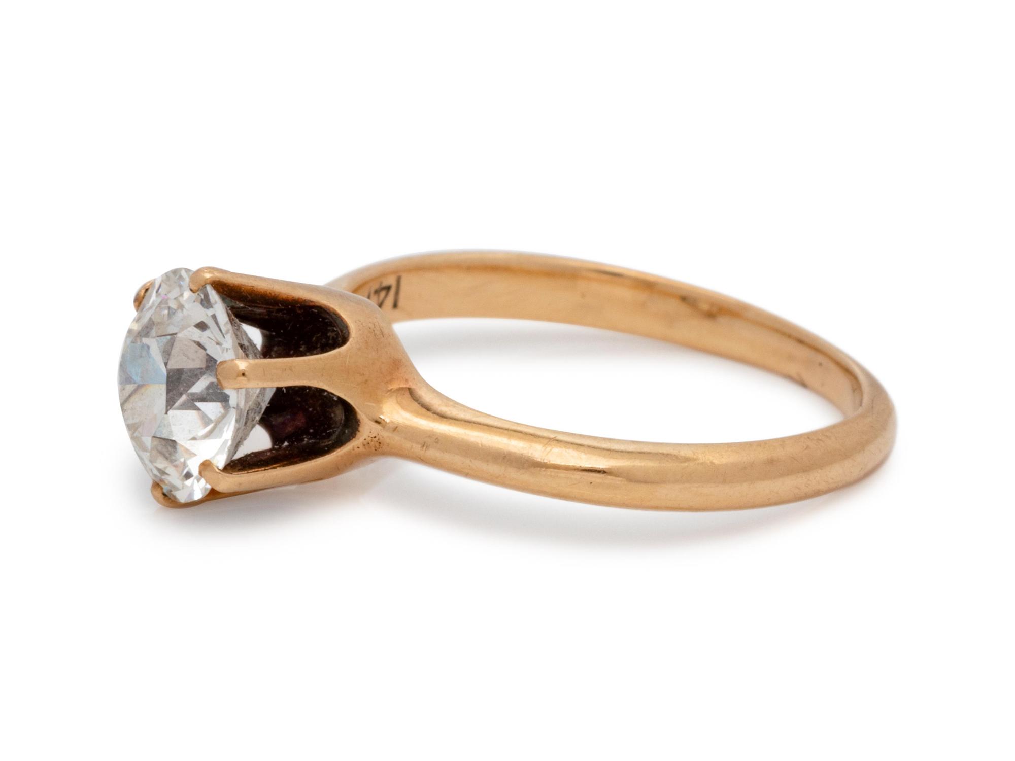 A 14 Karat Yellow Gold and Diamond Ring,