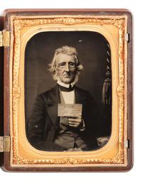 [EARLY PHOTOGRAPHY]. Quarter plate ambrotype of an aged gentleman holding up an affectionate note to his daughter. Ca 1862.