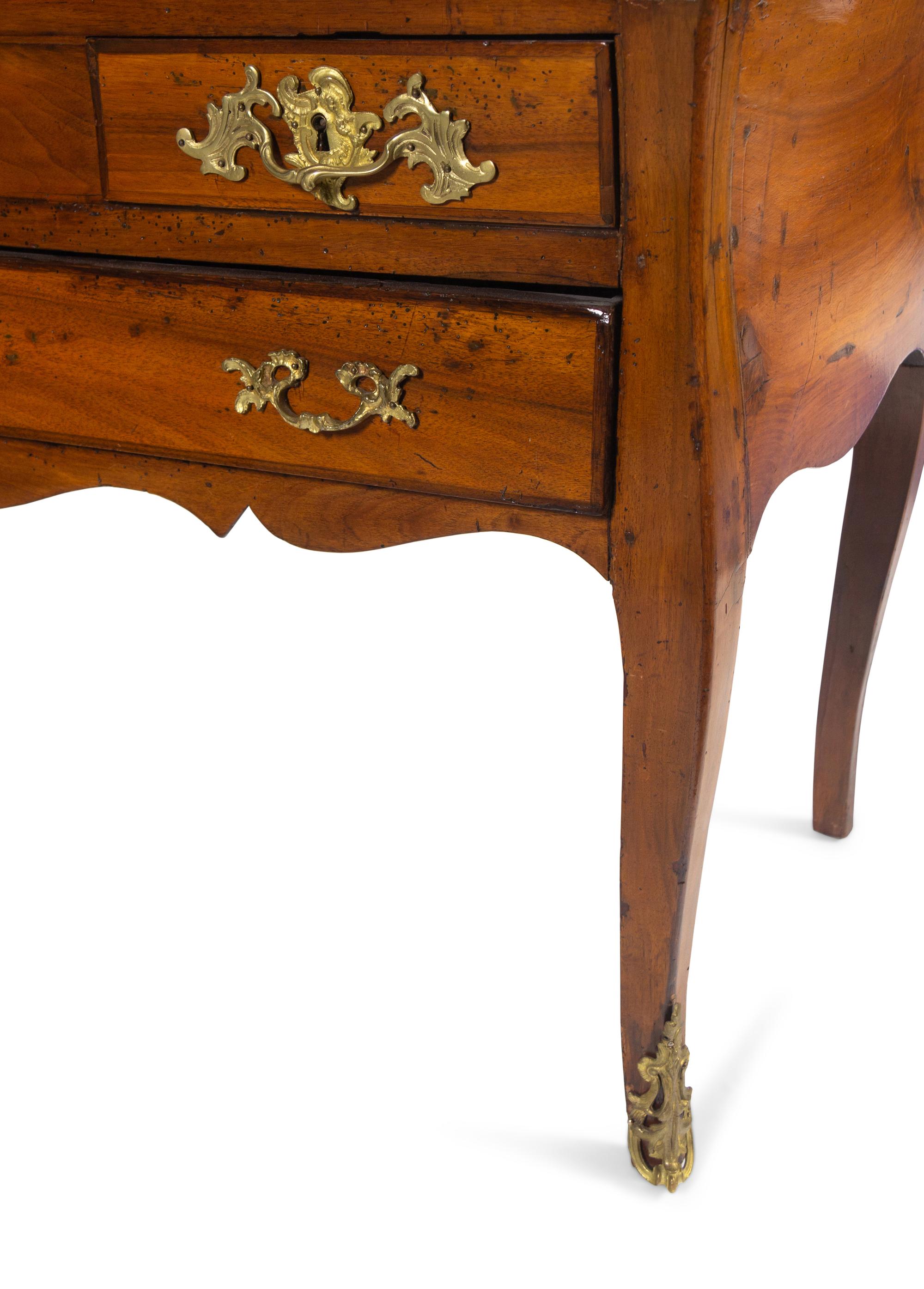 A Louis XV Gilt Bronze Mounted Walnut, Mahogany and Marquetry Bureau en Pente