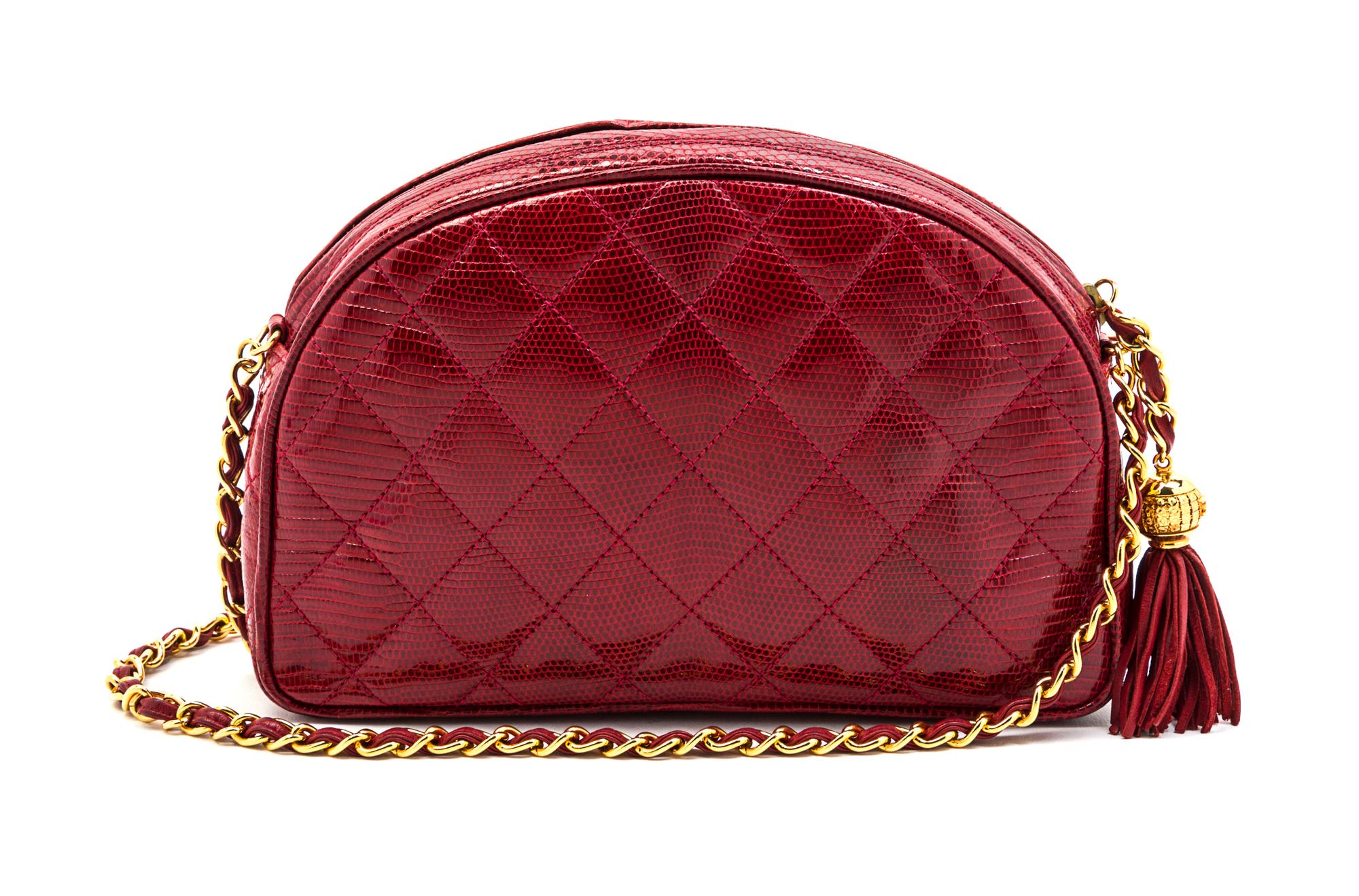 A Chanel Red Quilted Lizardskin Bag, 9 x 5 x 2 inches.