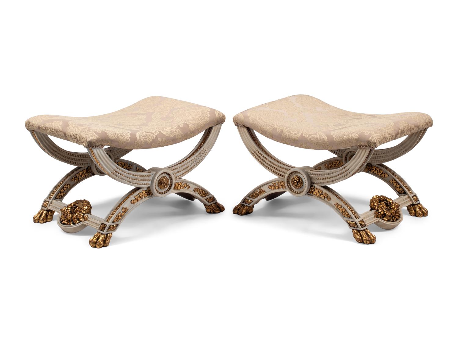 A Pair of Continental Painted and Parcel Gilt Curule-Form Tabourets