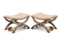 A Pair of Continental Painted and Parcel Gilt Curule-Form Tabourets