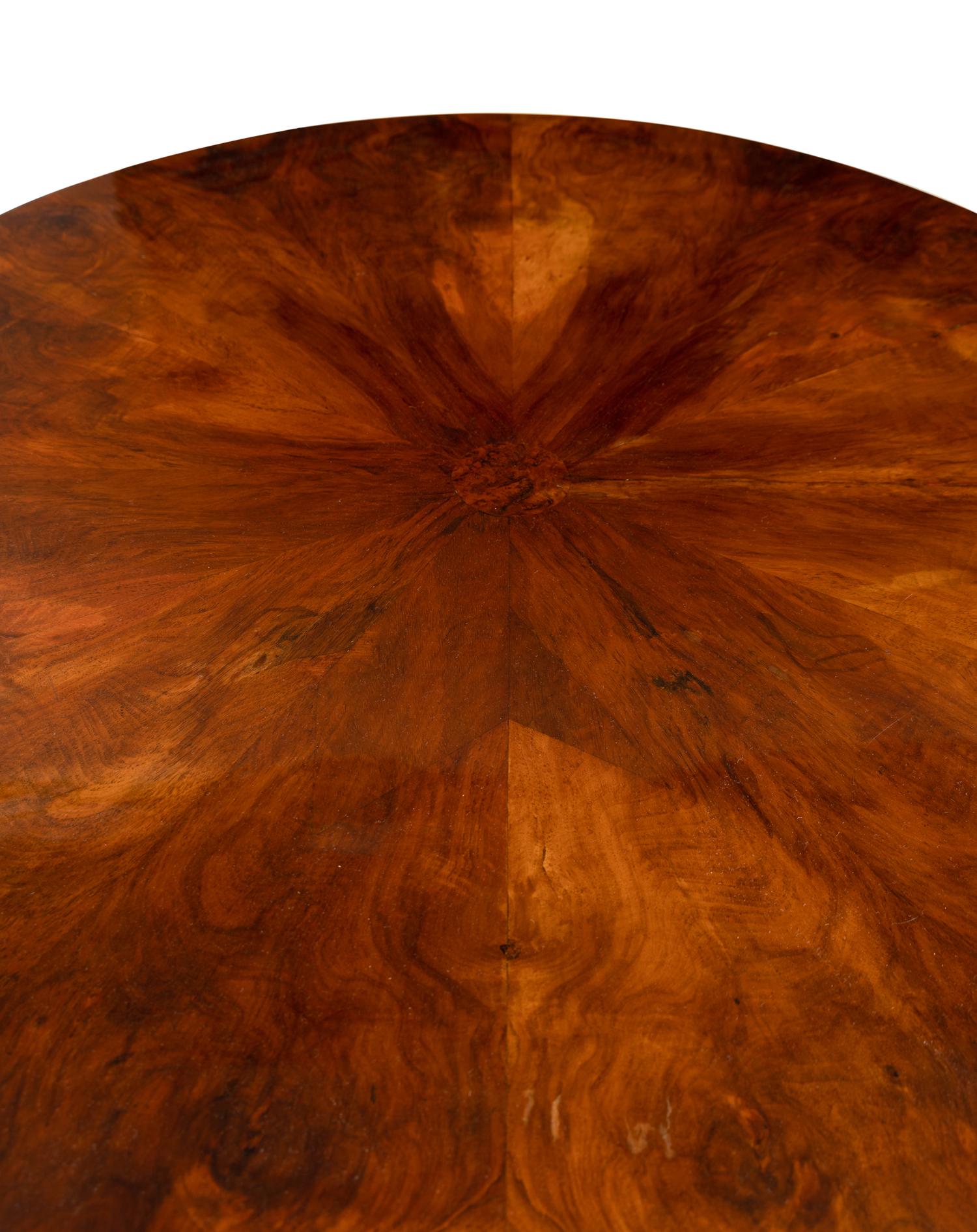 A German Part-Ebonized Walnut and Burl Maple Center Table