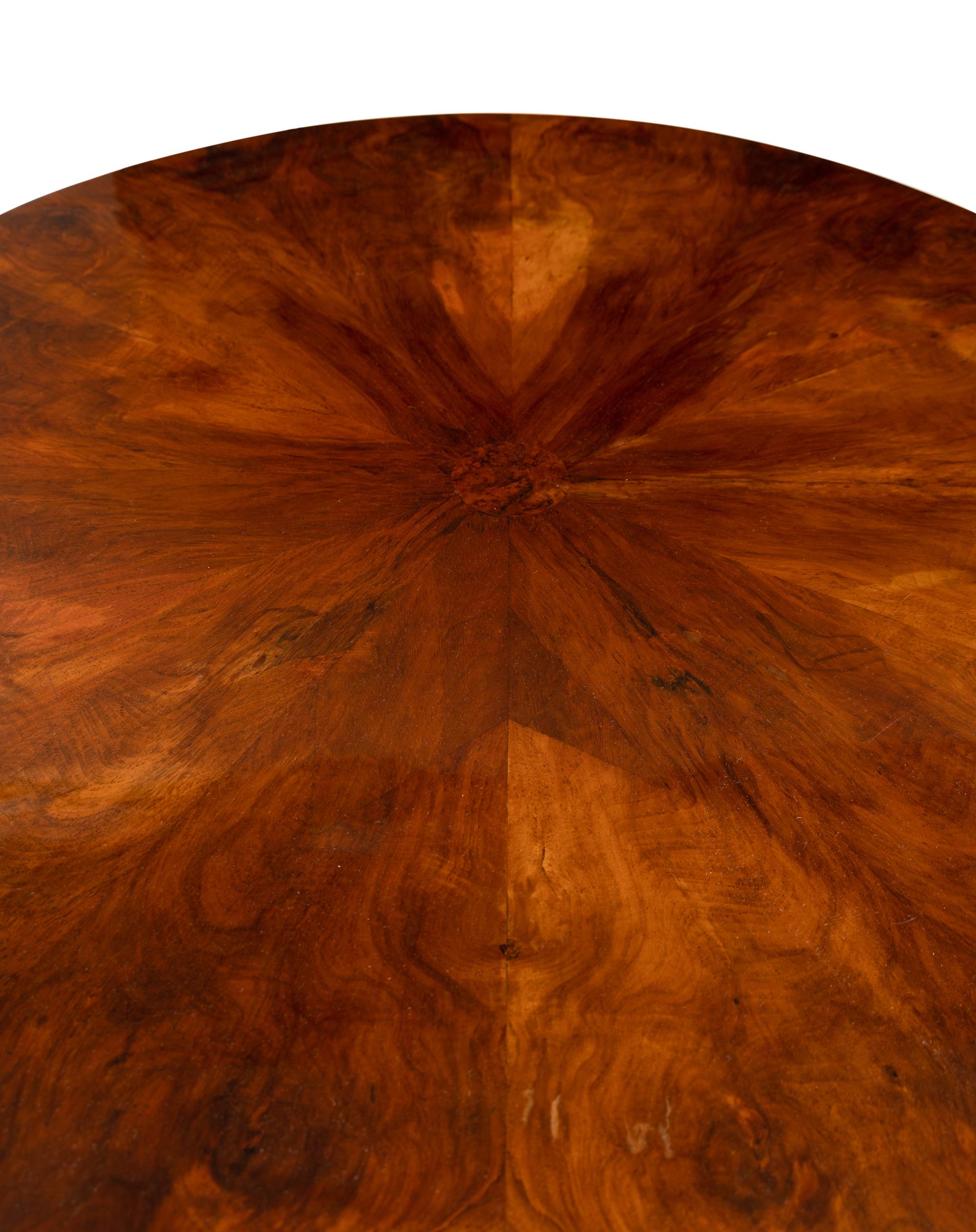 A German Part-Ebonized Walnut and Burl Maple Center Table