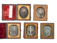 35 sixth plate daguerreotypes featuring women of varying ages.
