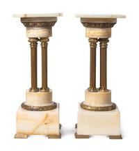 A Pair of Continental Gilt Bronze Mounted Onyx Pedestals