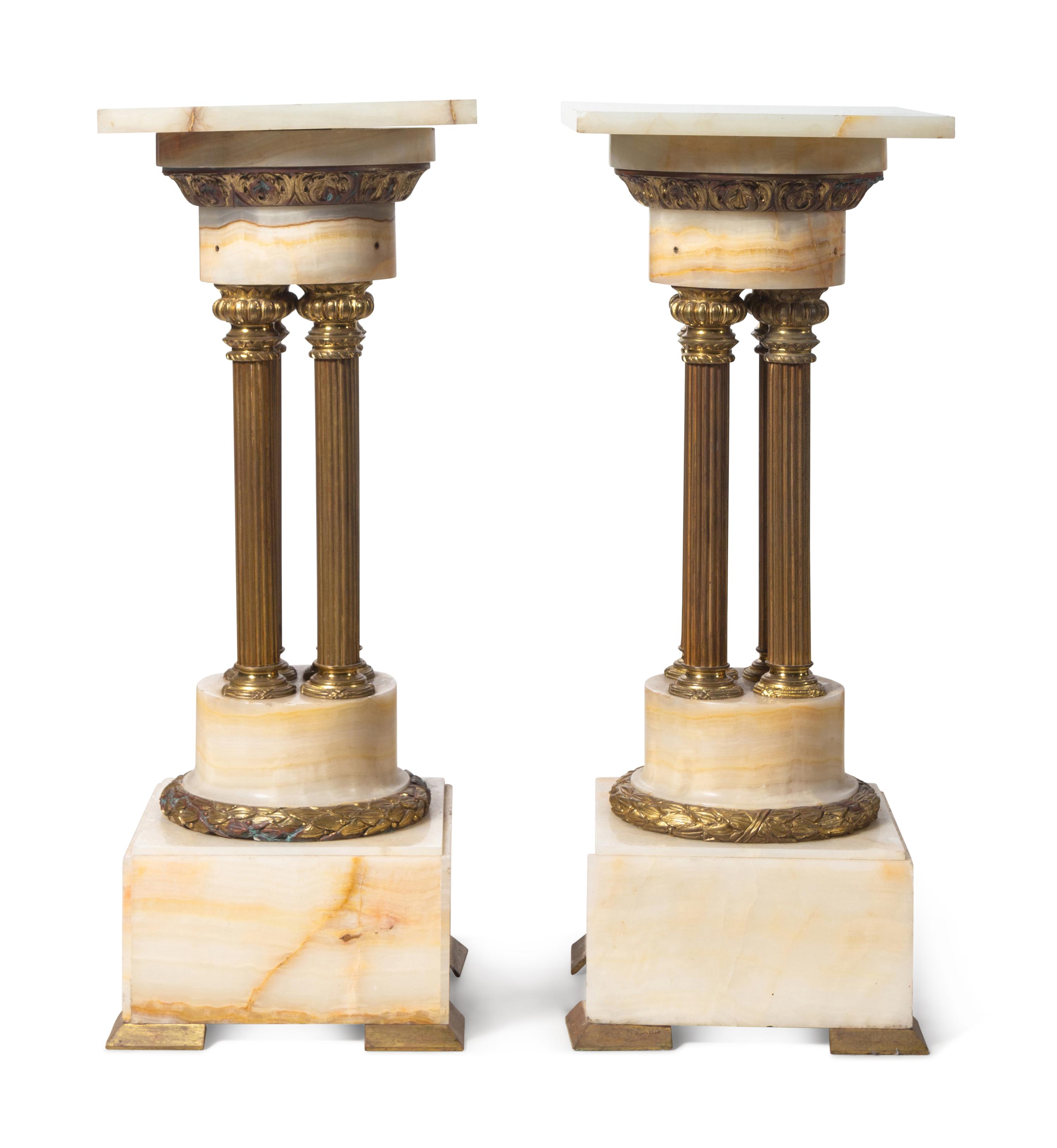 A Pair of Continental Gilt Bronze Mounted Onyx Pedestals