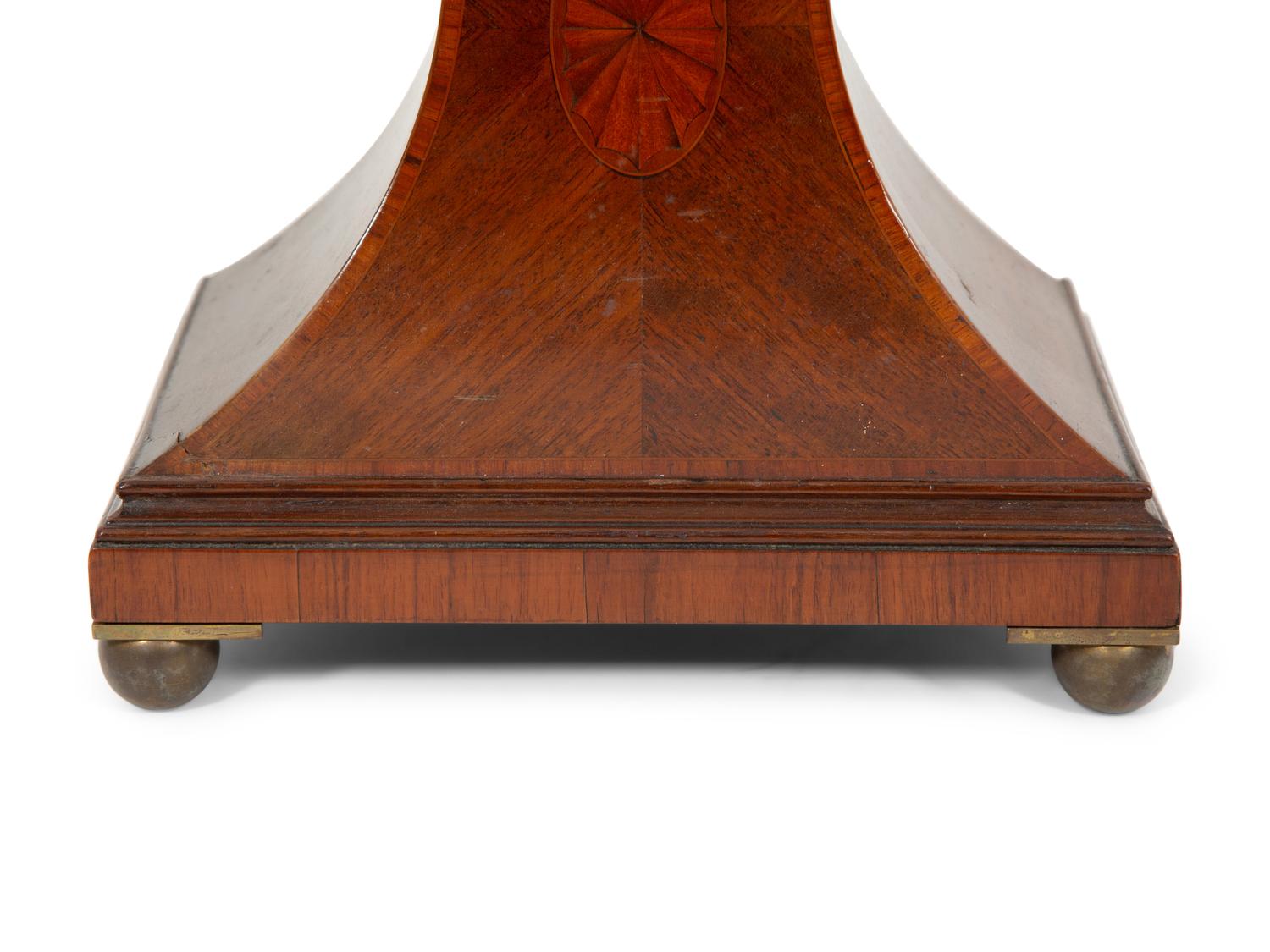 A Victorian Mahogany Balloon Clock