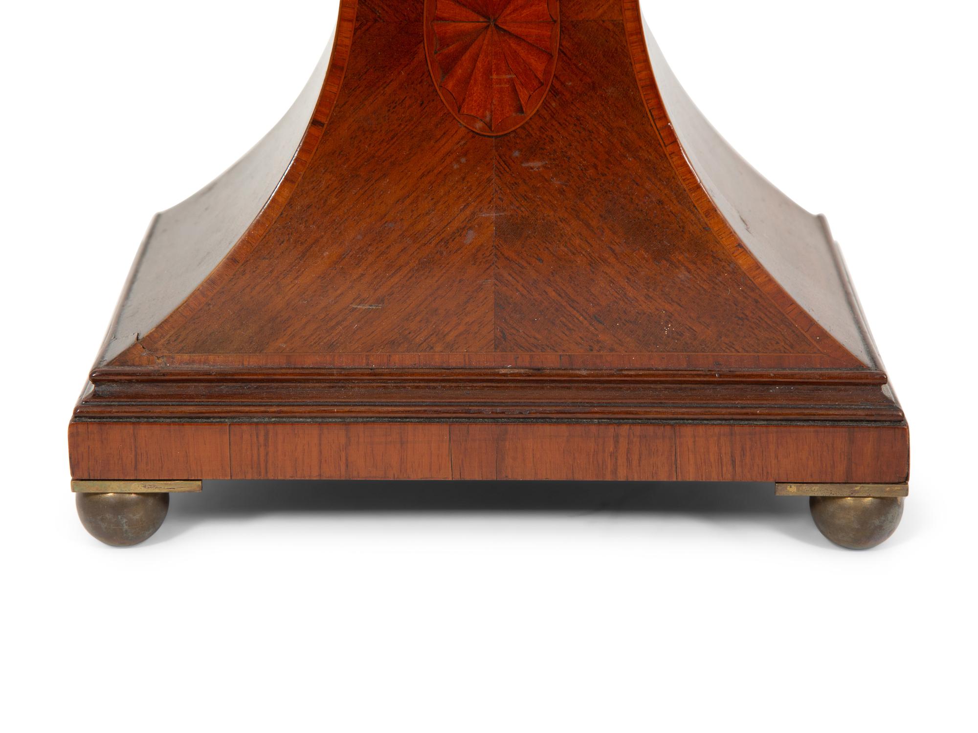 A Victorian Mahogany Balloon Clock