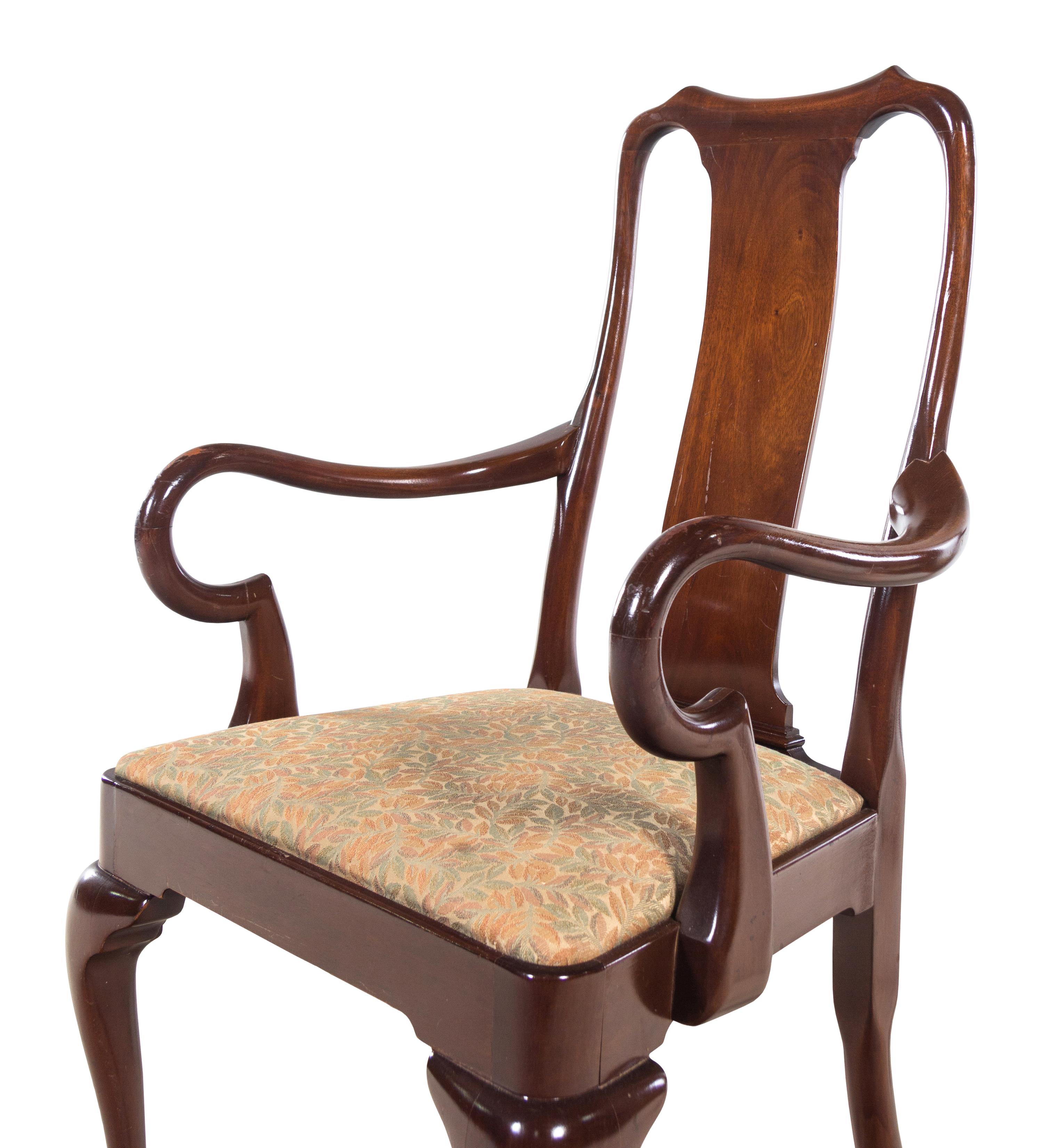 A Set of Seven Queen Anne Style Mahogany Dining Chairs