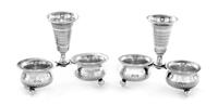 A Pair of Polish Silver-Plate Table Articles, Jakubowski & Jarra, each having a central trumpet-form vase surmounting two salts raised