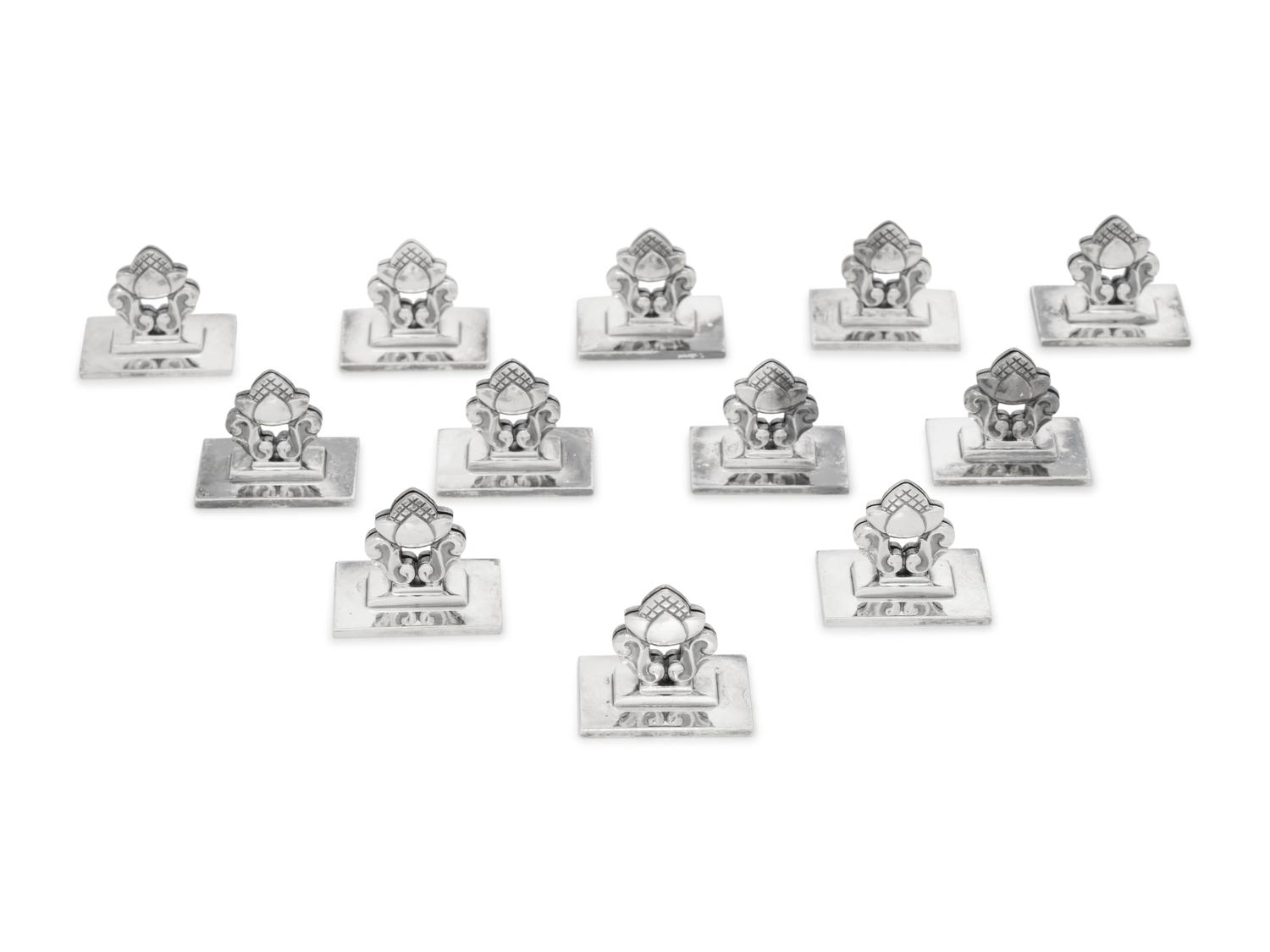 A Set of Twelve Georg Jensen Silver Acorn Place Card Holders