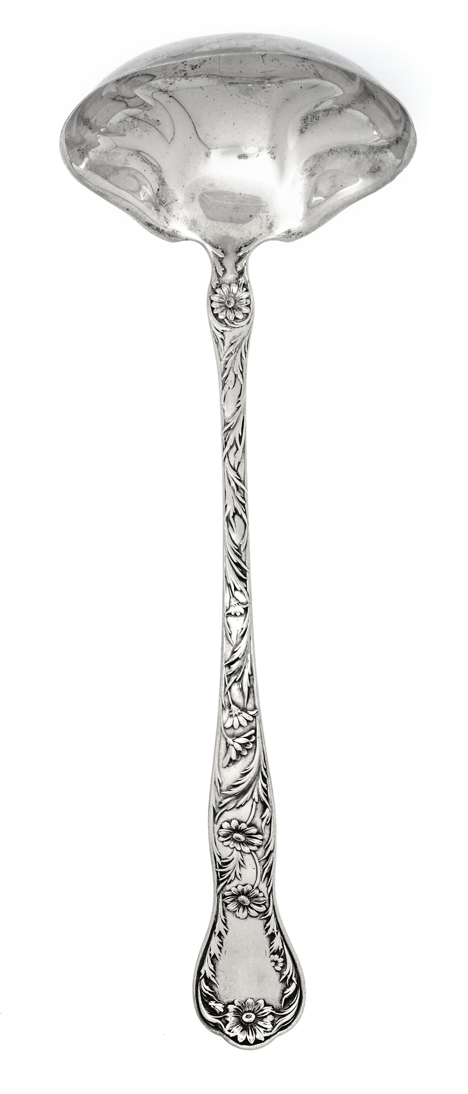 An American Silver Soup Ladle, Gorham Mfg. Co., Providence, RI, Marguerite pattern, decorated with flowers and foliate scrolls.