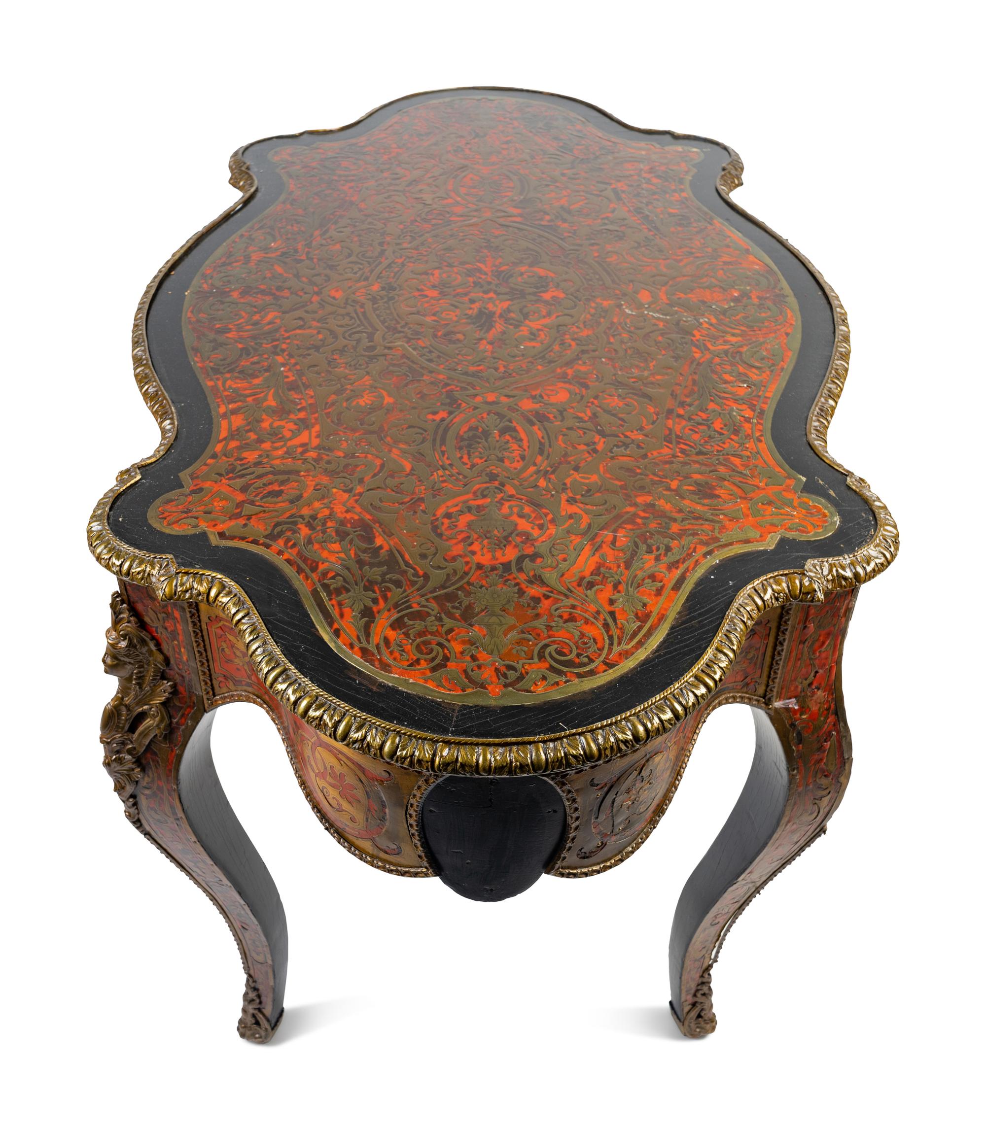 A Napoleon III Style Brass and Tortoise Shell Inlaid Center Table