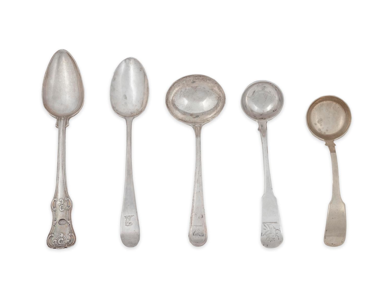 A Group of English Silver Serving Spoons and Ladles