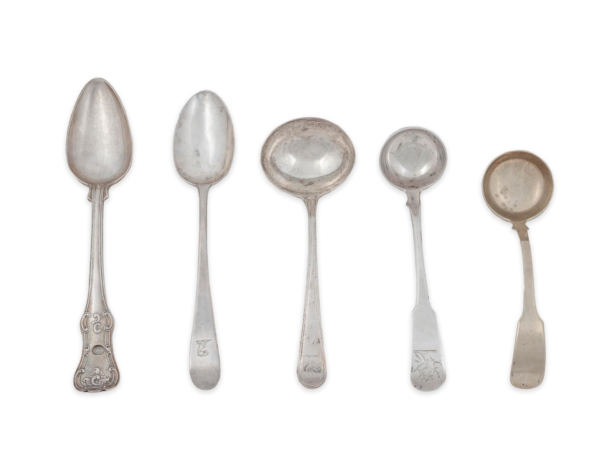 A Group of English Silver Serving Spoons and Ladles