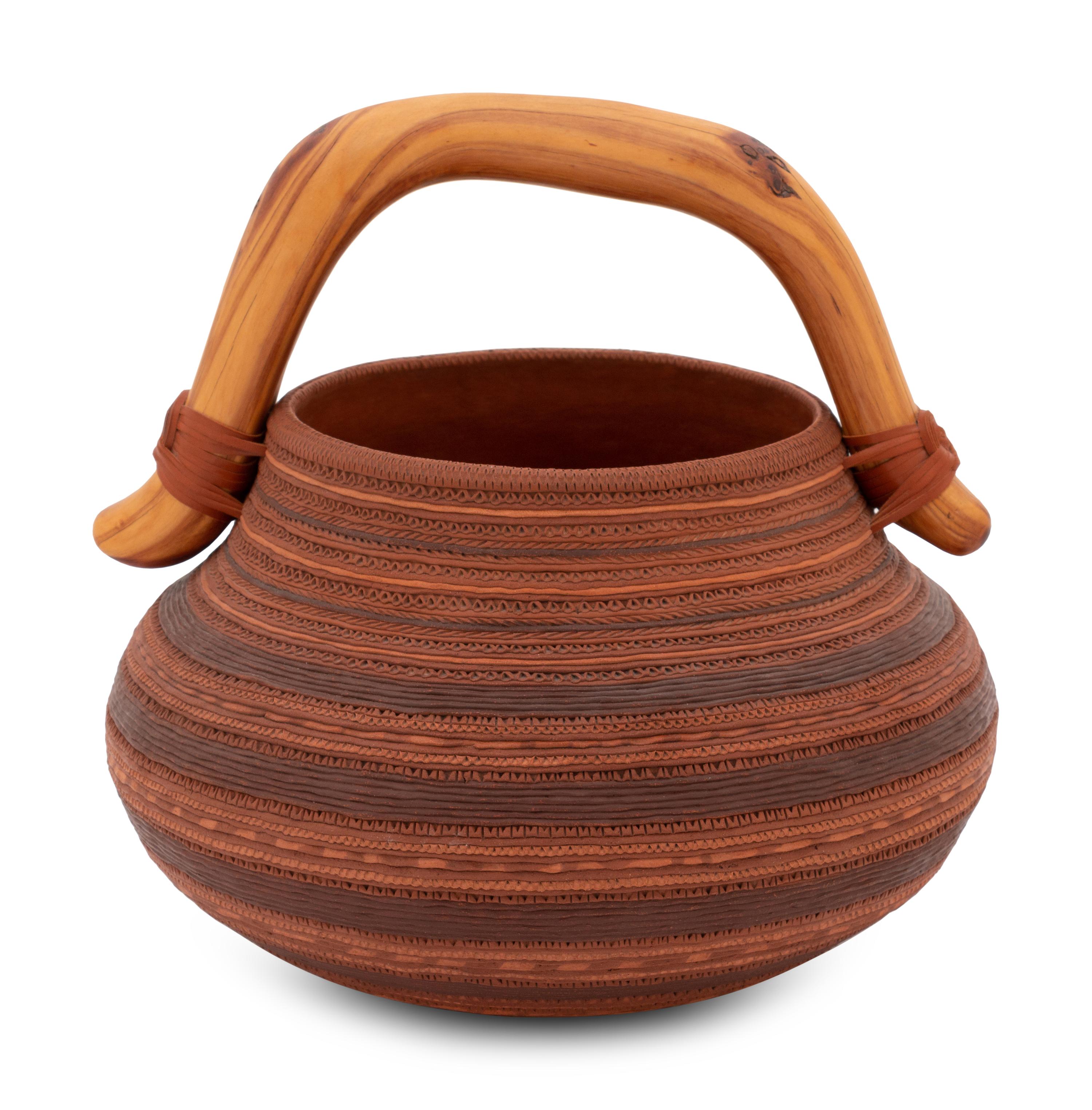 Corrugated Pottery Jar, with Wood Handle