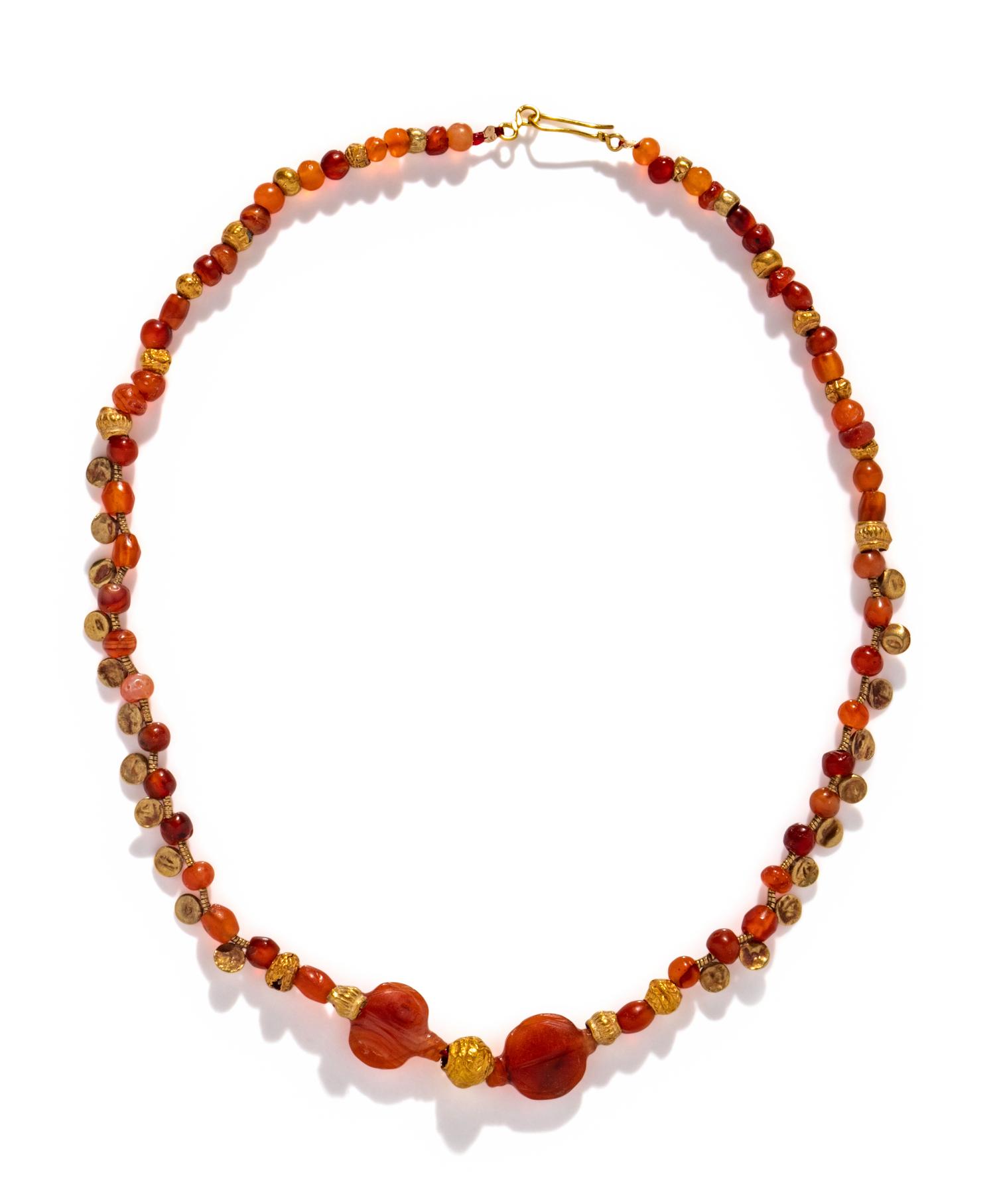 An Islamic Carnelian and Gold Bead Necklace