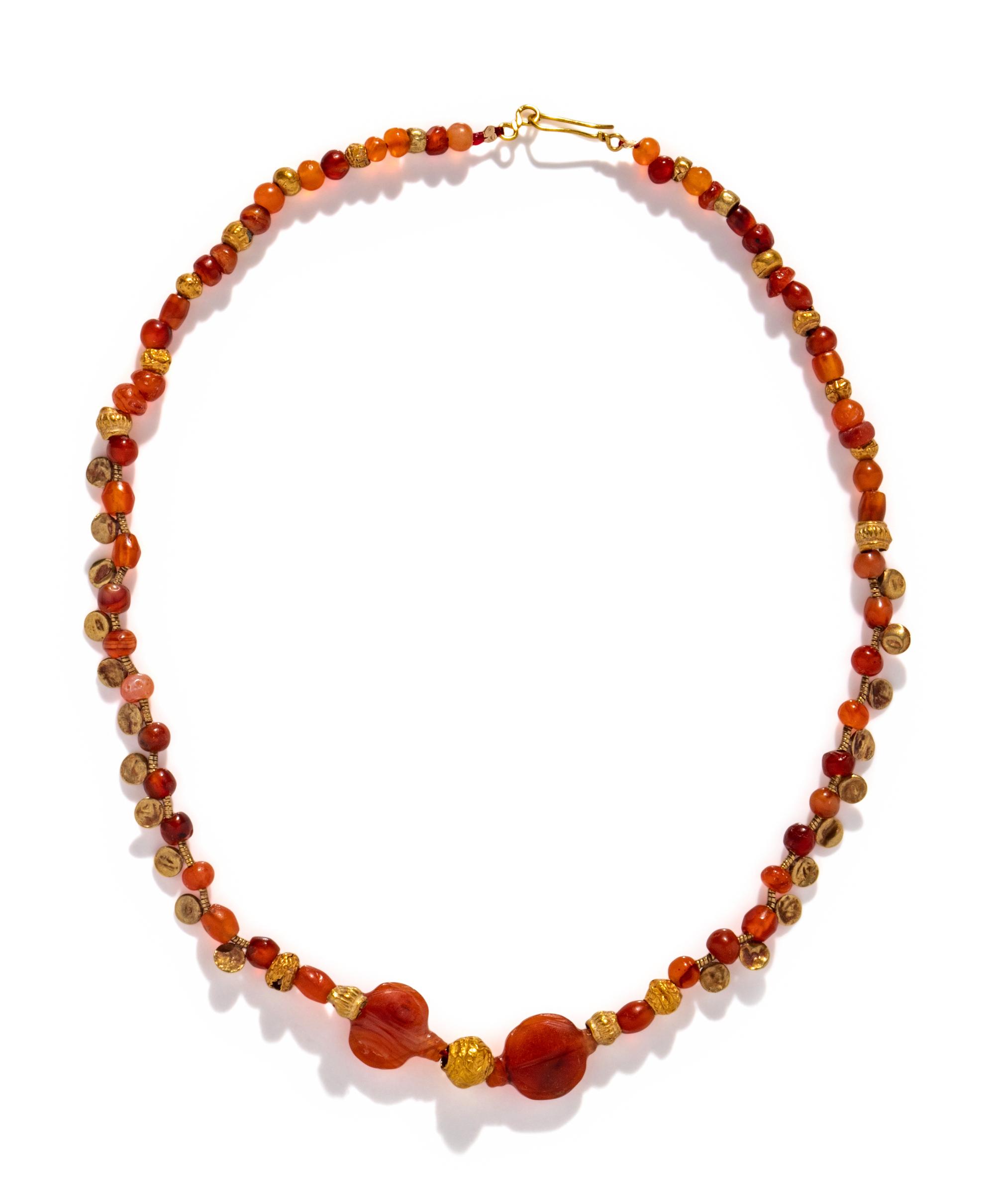 An Islamic Carnelian and Gold Bead Necklace