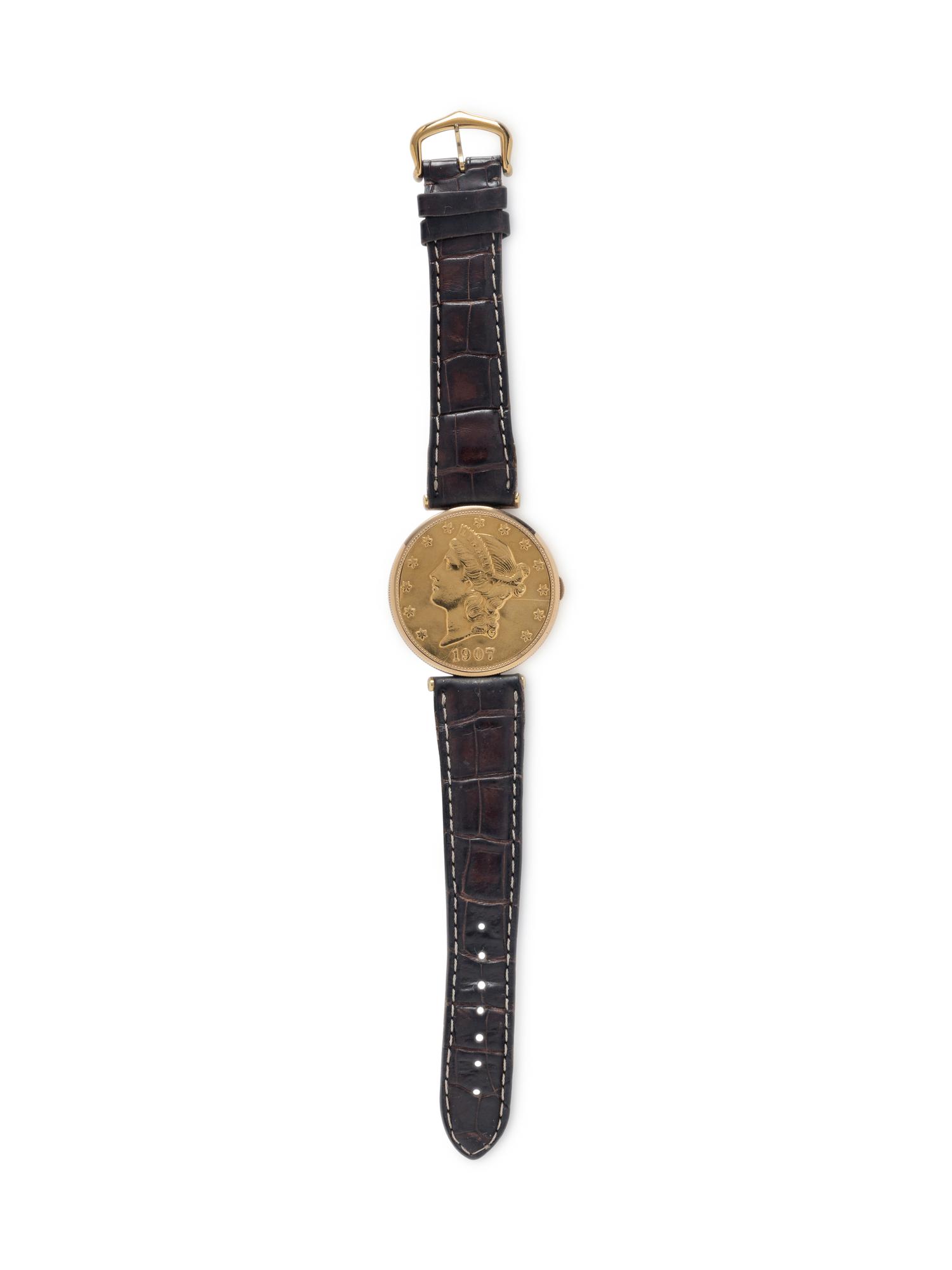 CORUM, 18K YELLOW GOLD HIDDEN DIAL COIN WATCH