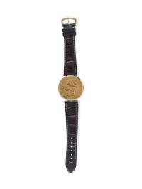 CORUM, 18K YELLOW GOLD HIDDEN DIAL COIN WATCH