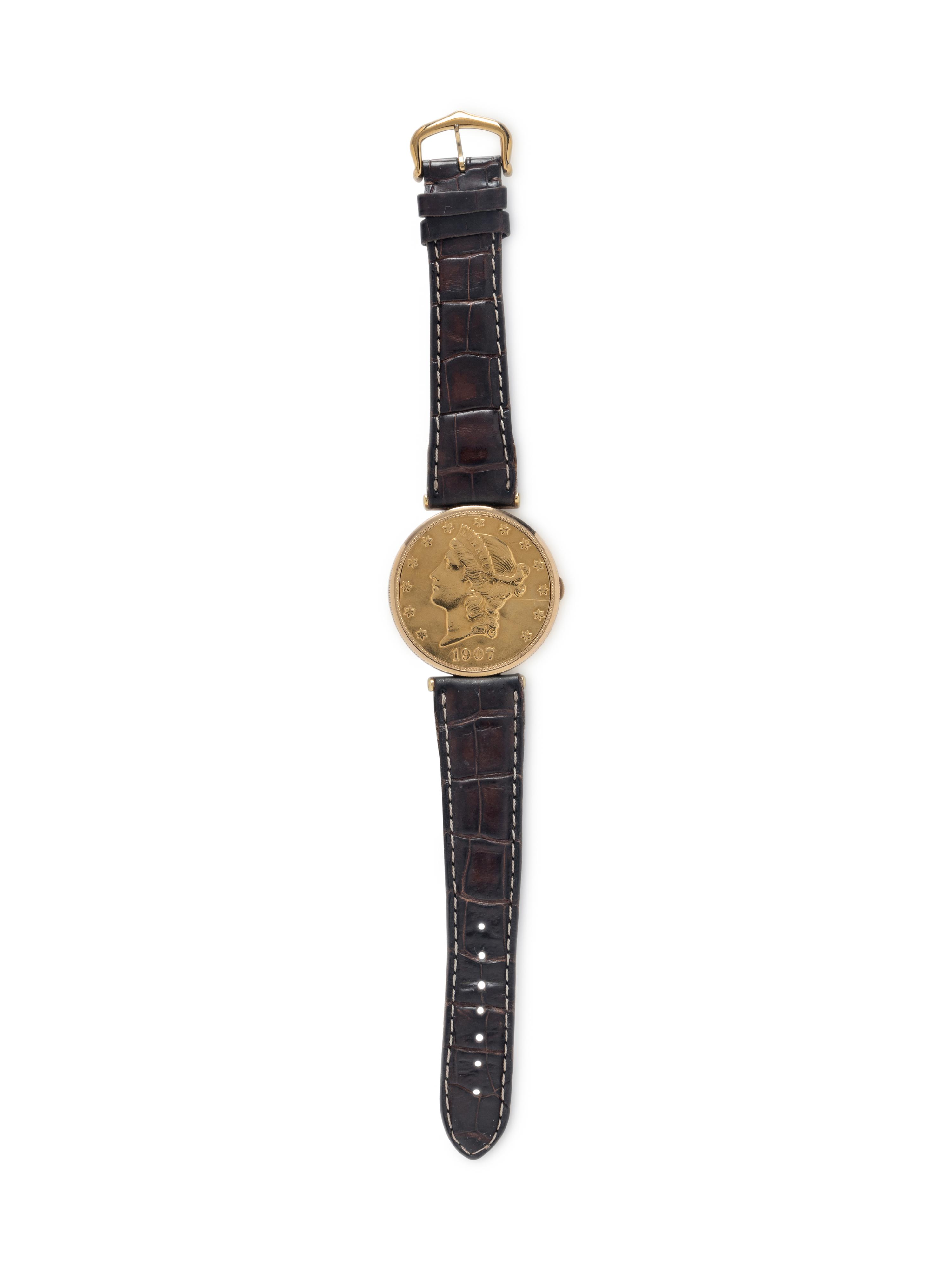 CORUM, 18K YELLOW GOLD HIDDEN DIAL COIN WATCH