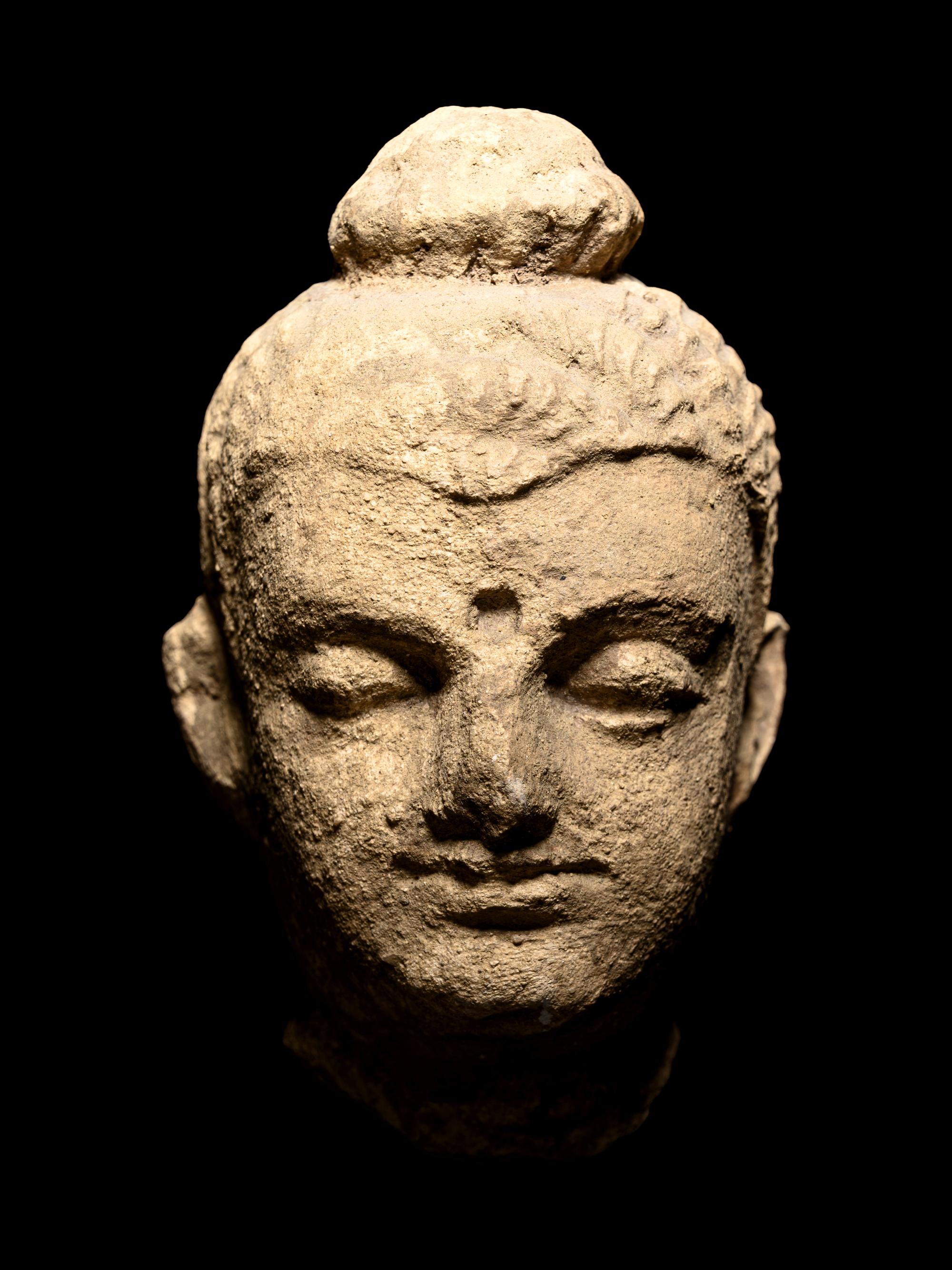 Two Gandharan Fragmentary Stucco Heads