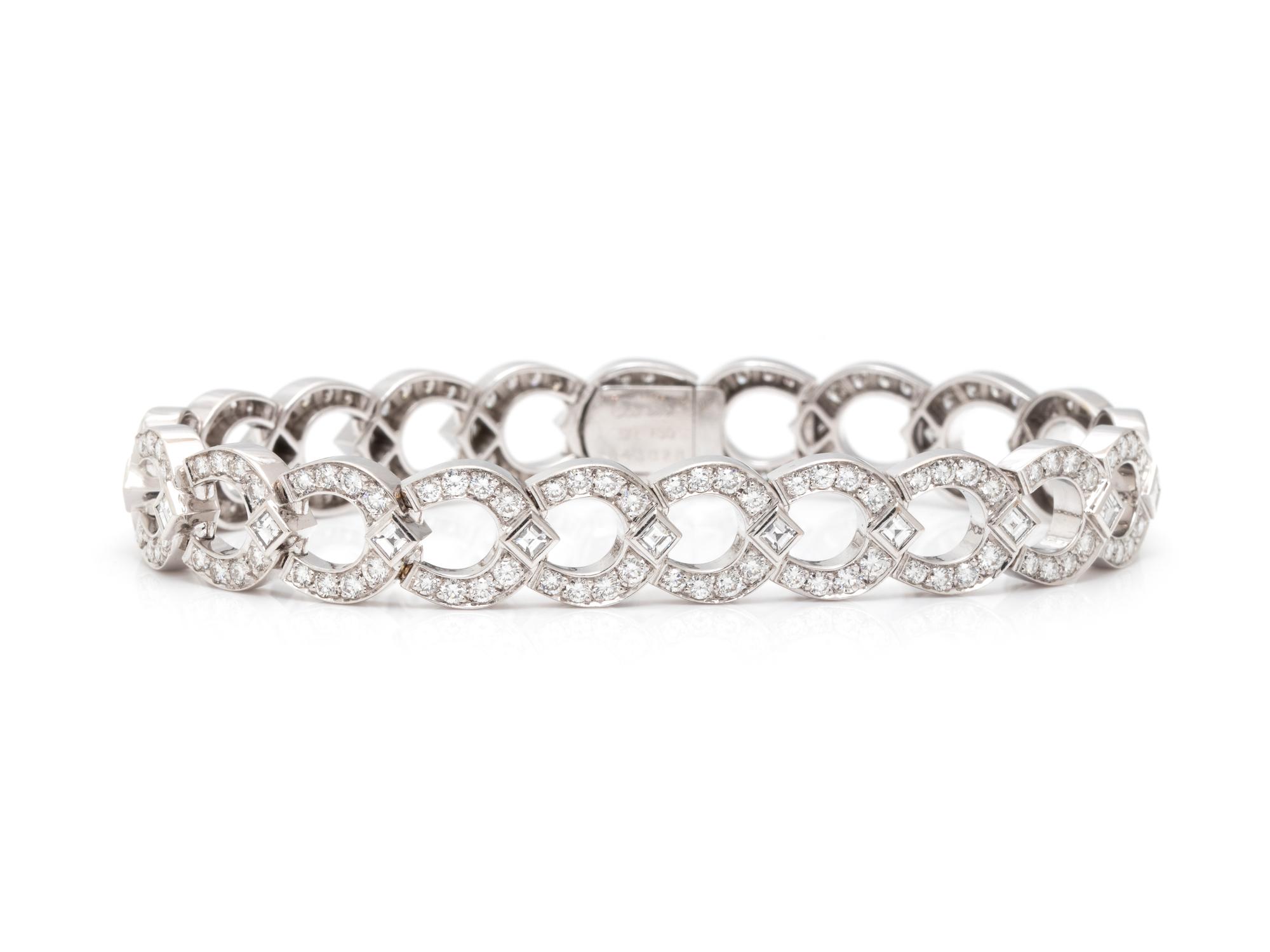 CARTIER, DIAMOND AND WHITE GOLD 'C LINK' BRACELET