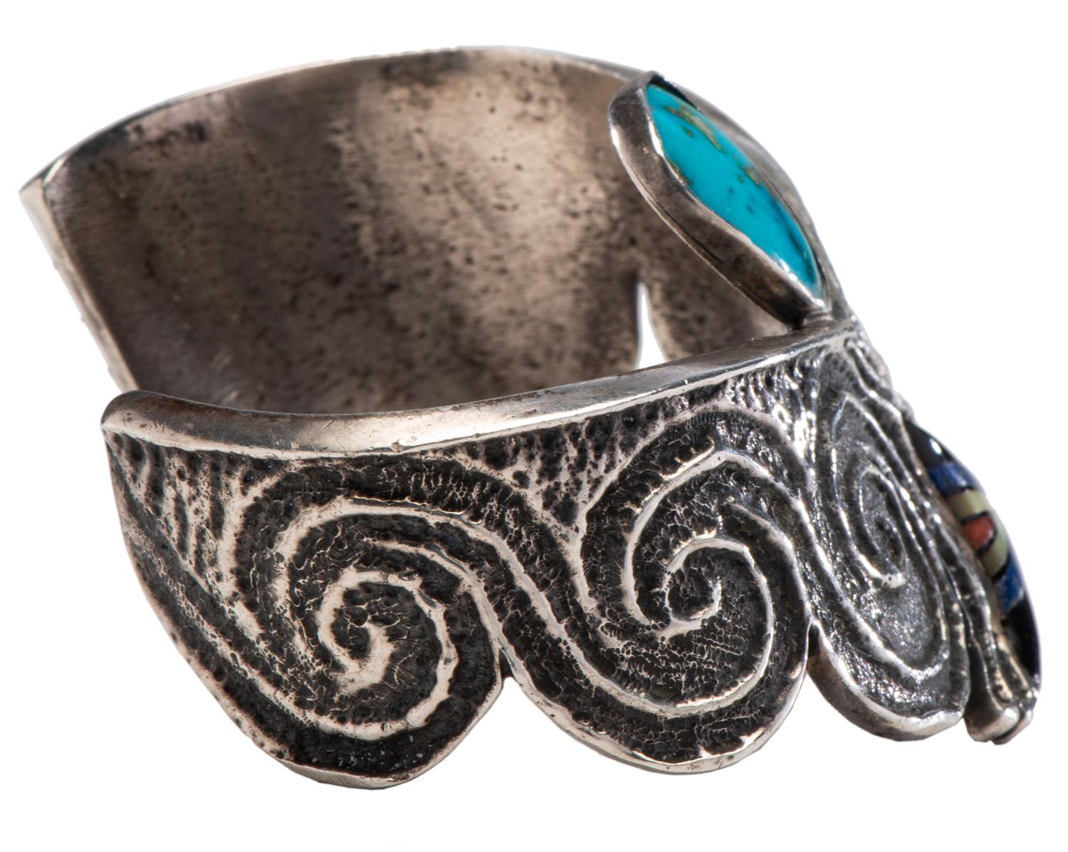 Tufa Cast Silver Cuff, with Turquoise, Jet, Shell, Coral, and Lapis Inlay Lot is located and will ship from Denver, Colorado.