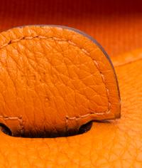 An Hermes Orange Evelyne III PM Handbag, 11.25" x 12" x 2.5".