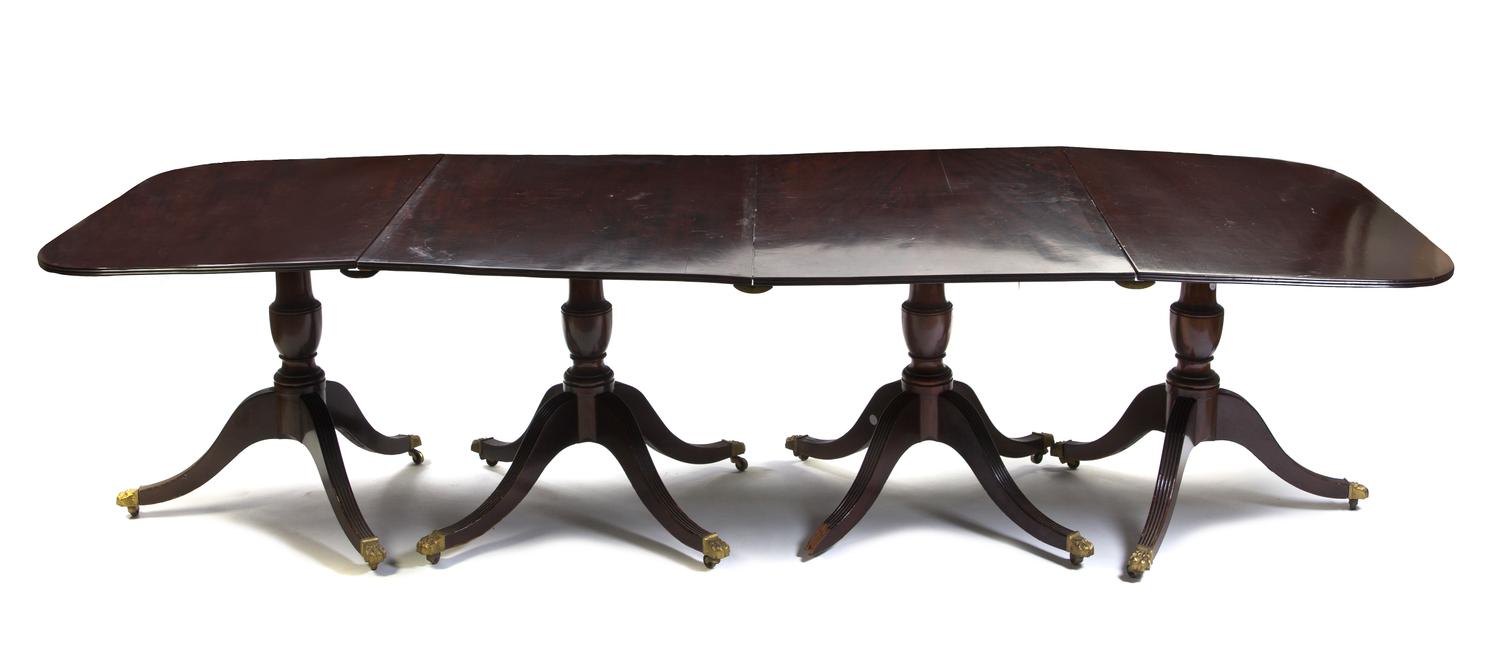 A Georgian Style Mahogany Quadruple Pedestal Dining Table, Height 29 3/4 x width 115 3/4 x depth 43 1/4 inches, together with 3 additio