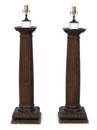 A Pair of Italian Carved Walnut Columns Mounted as Lamps — 18TH CENTURY