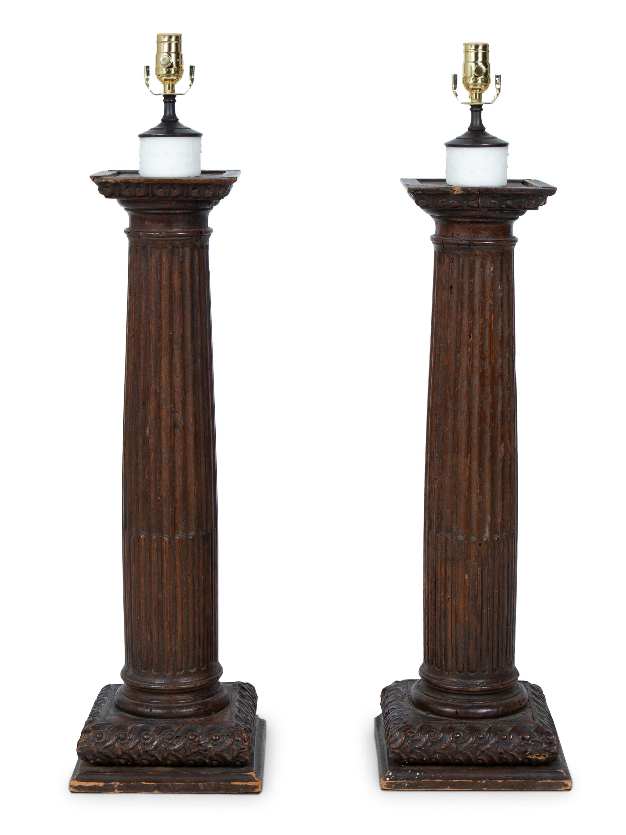 A Pair of Italian Carved Walnut Columns Mounted as Lamps — 18TH CENTURY