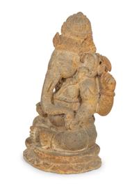 An Indian Cast Stone Figure of Ganesh