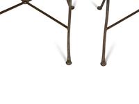 A Set of Seven Patinated Metal Dining Chairs