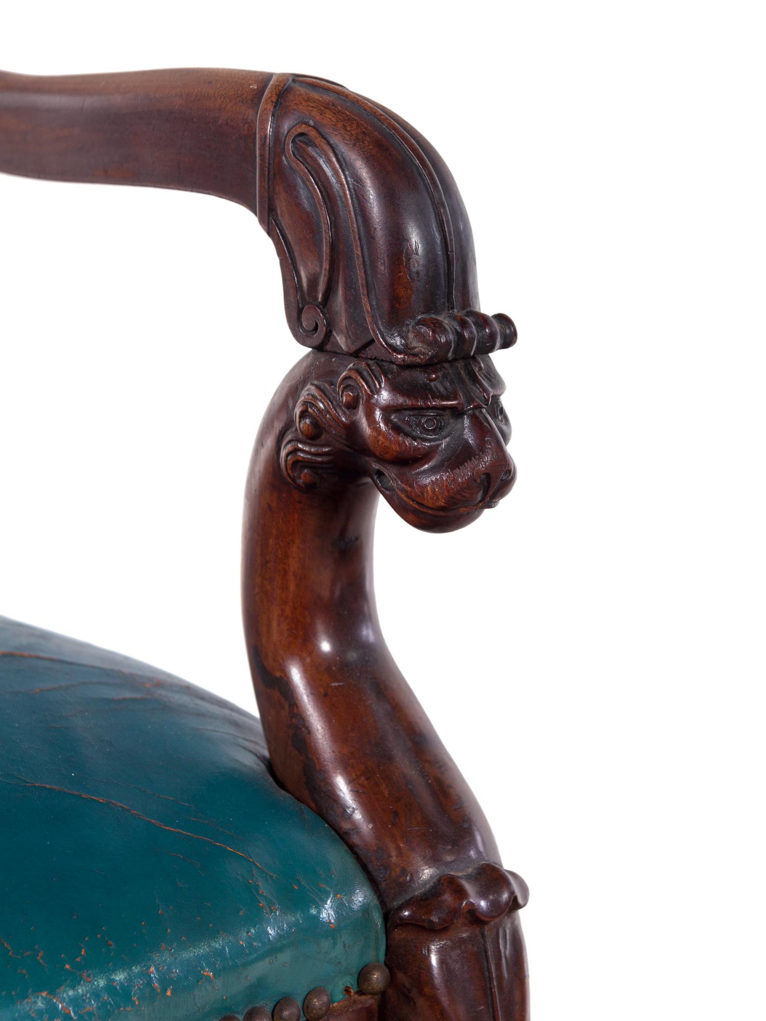 A Pair of Baltic Neoclassical Carved Mahogany Armchairs