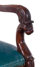 A Pair of Baltic Neoclassical Carved Mahogany Armchairs