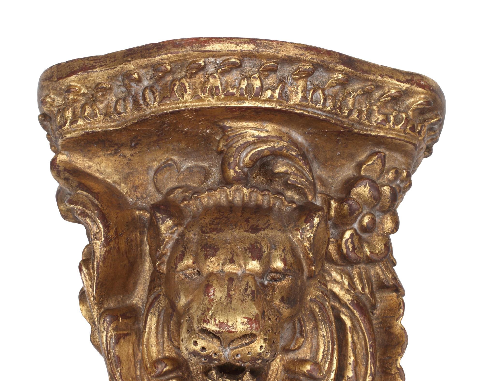 A Pair of Italian Giltwood Lion Motif Wall Brackets