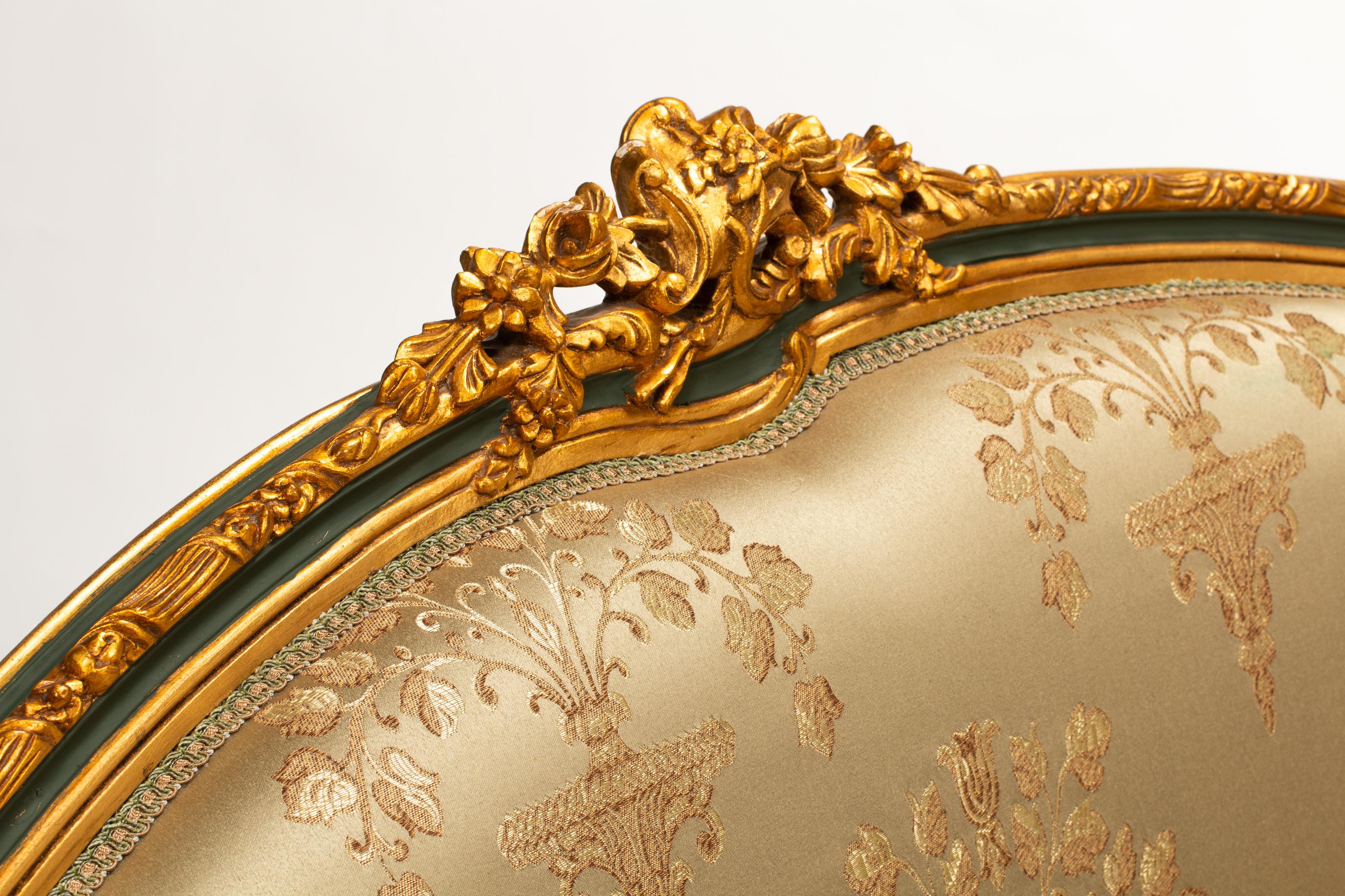 A Pair of Louis XV Style Painted and Parcel Gilt Settees