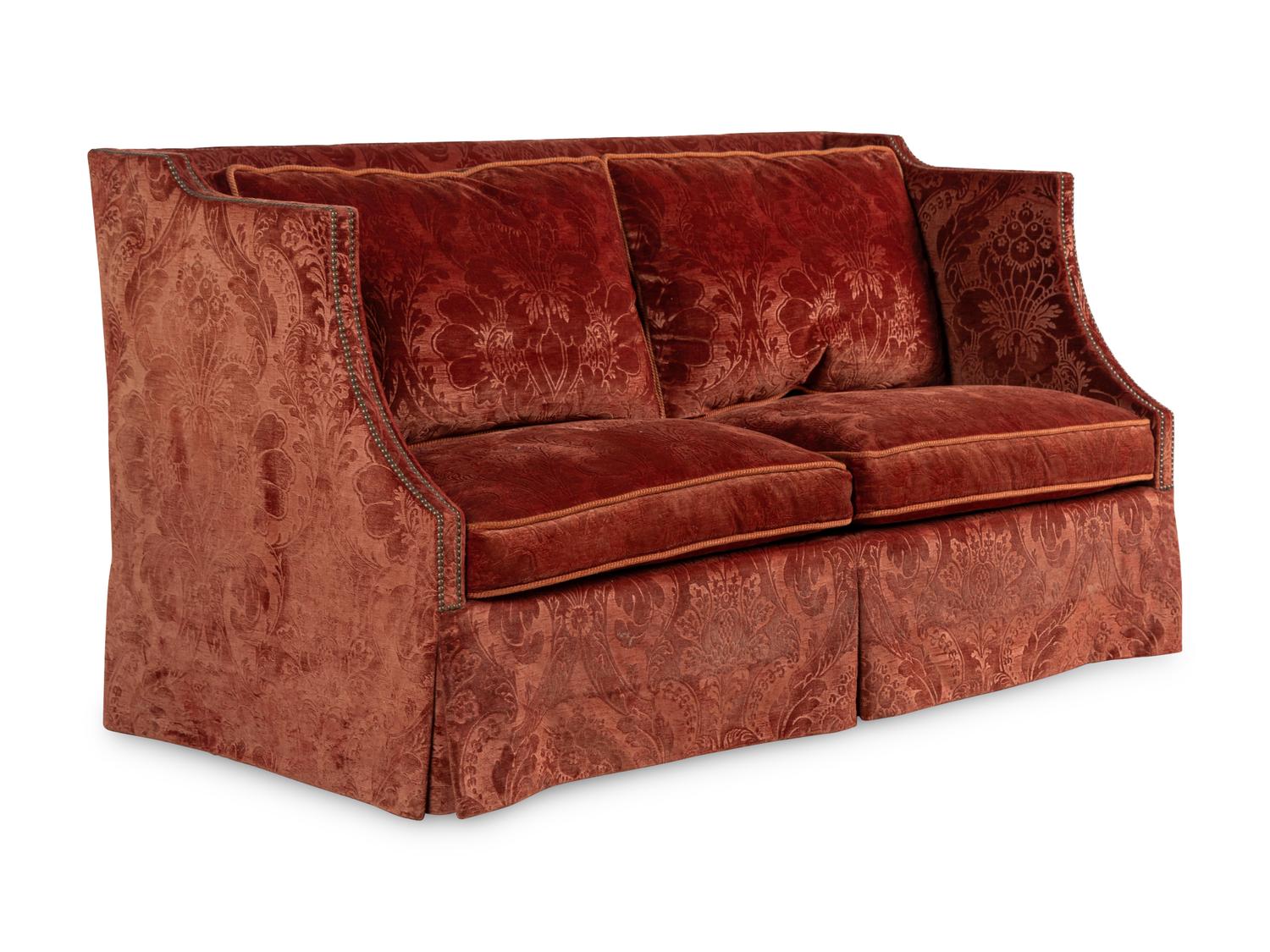 A Contemporary Upholstered Wingback Settee