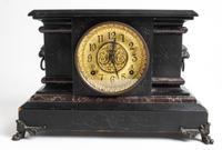An American Ebonized Mantel Clock Height 10 x width 16 inches. — LATE 19TH/EARLY 20TH CENTURY