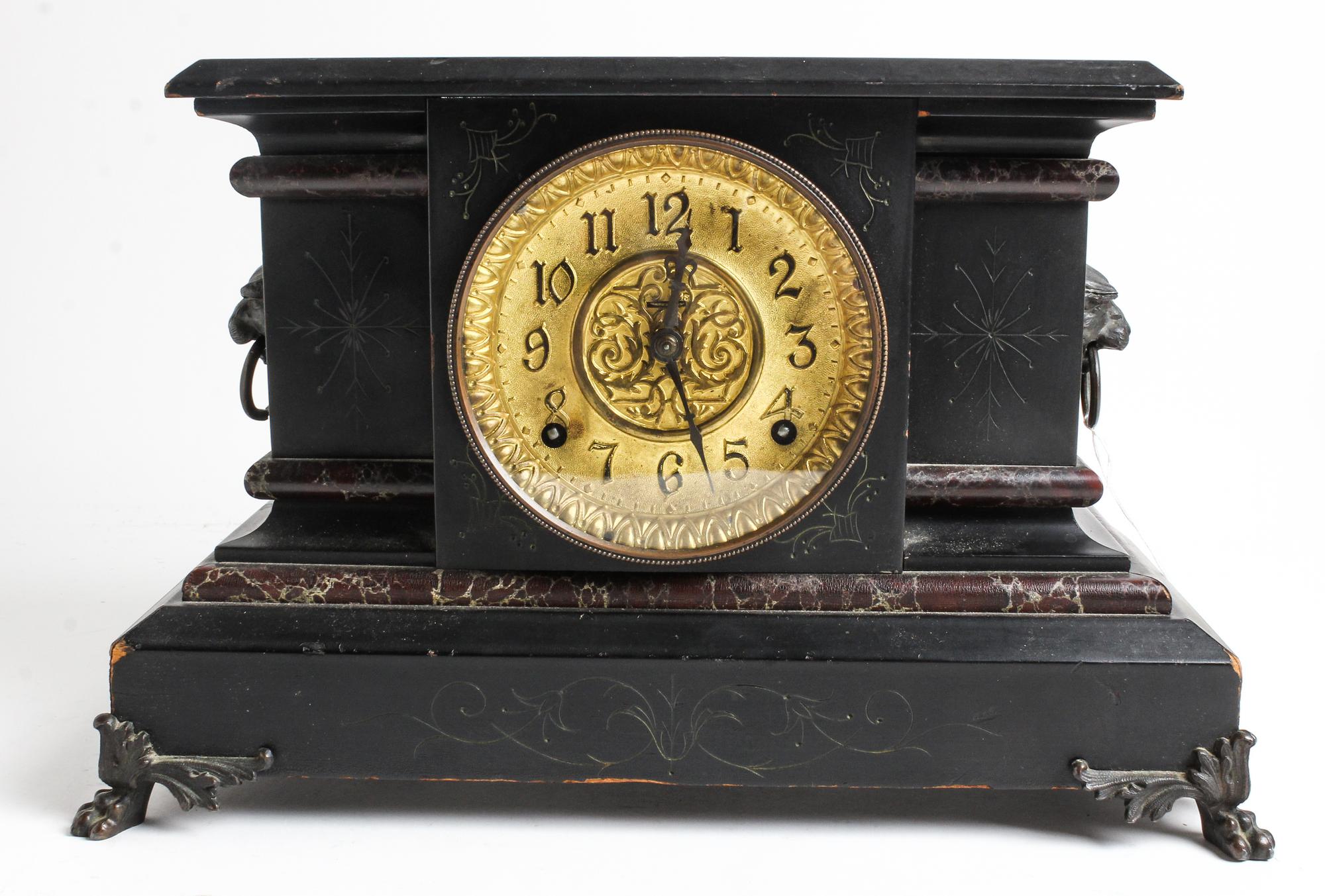 An American Ebonized Mantel Clock Height 10 x width 16 inches. — LATE 19TH/EARLY 20TH CENTURY