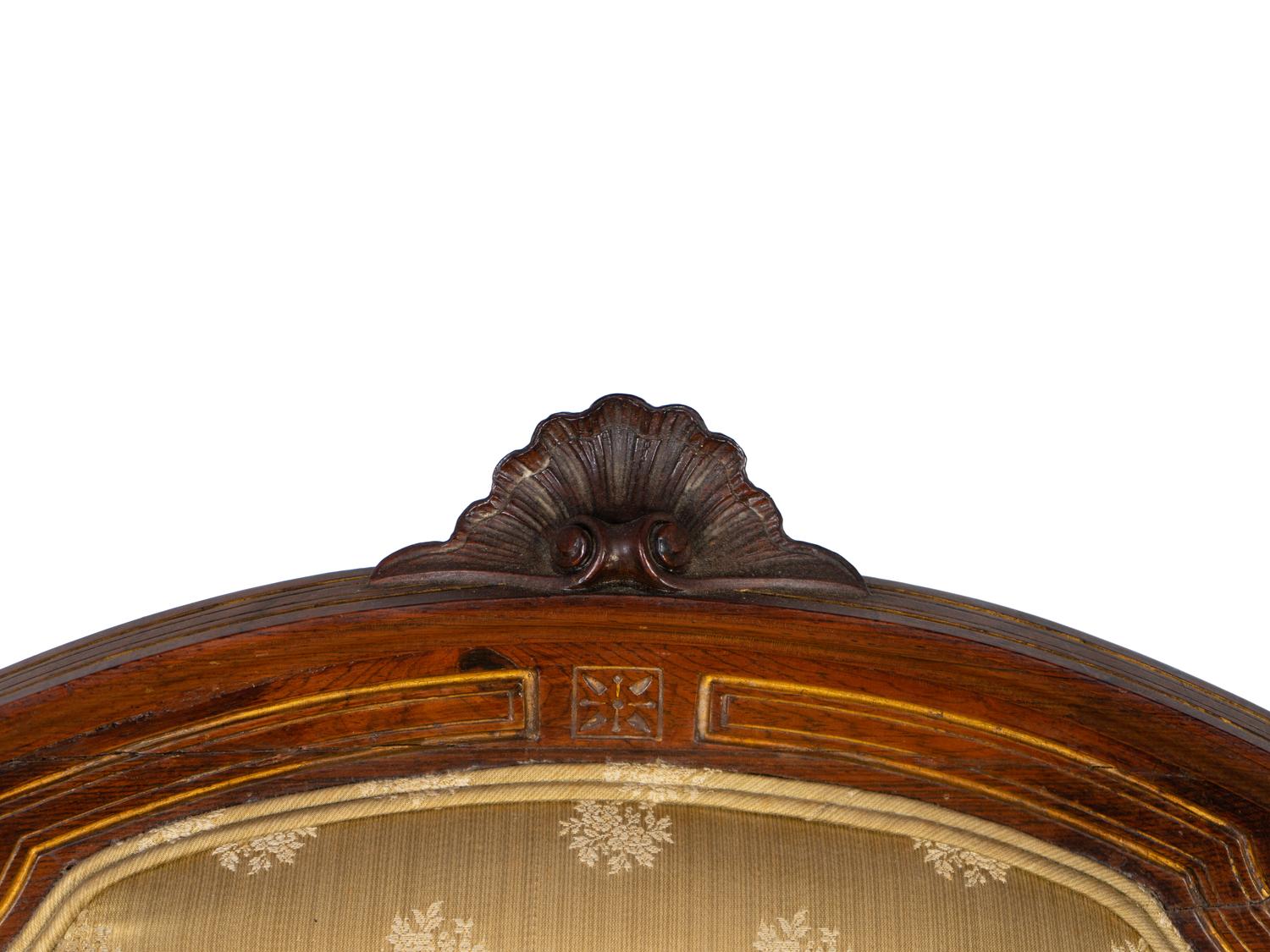 A Continental Parcel Gilt Walnut Four-Piece Seating Suite