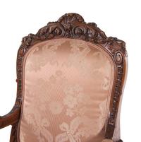 A Louis XV Style Carved Walnut Fauteuil