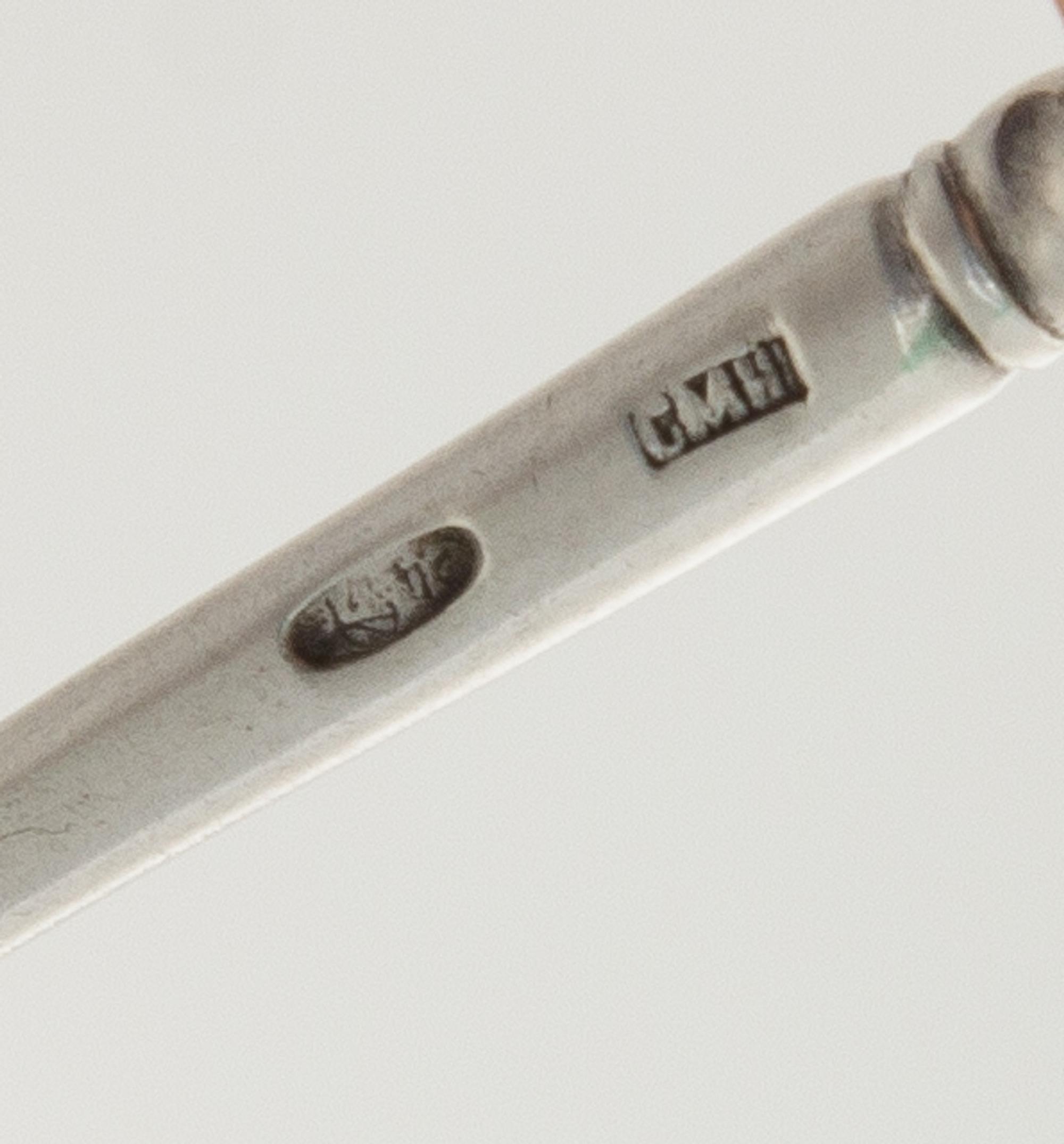 A Russian Niello Silver Spoon, Maker's Mark Cyrillic CMH, Moscow, having a knopped finial and a twist stem, the underside of the bowl h