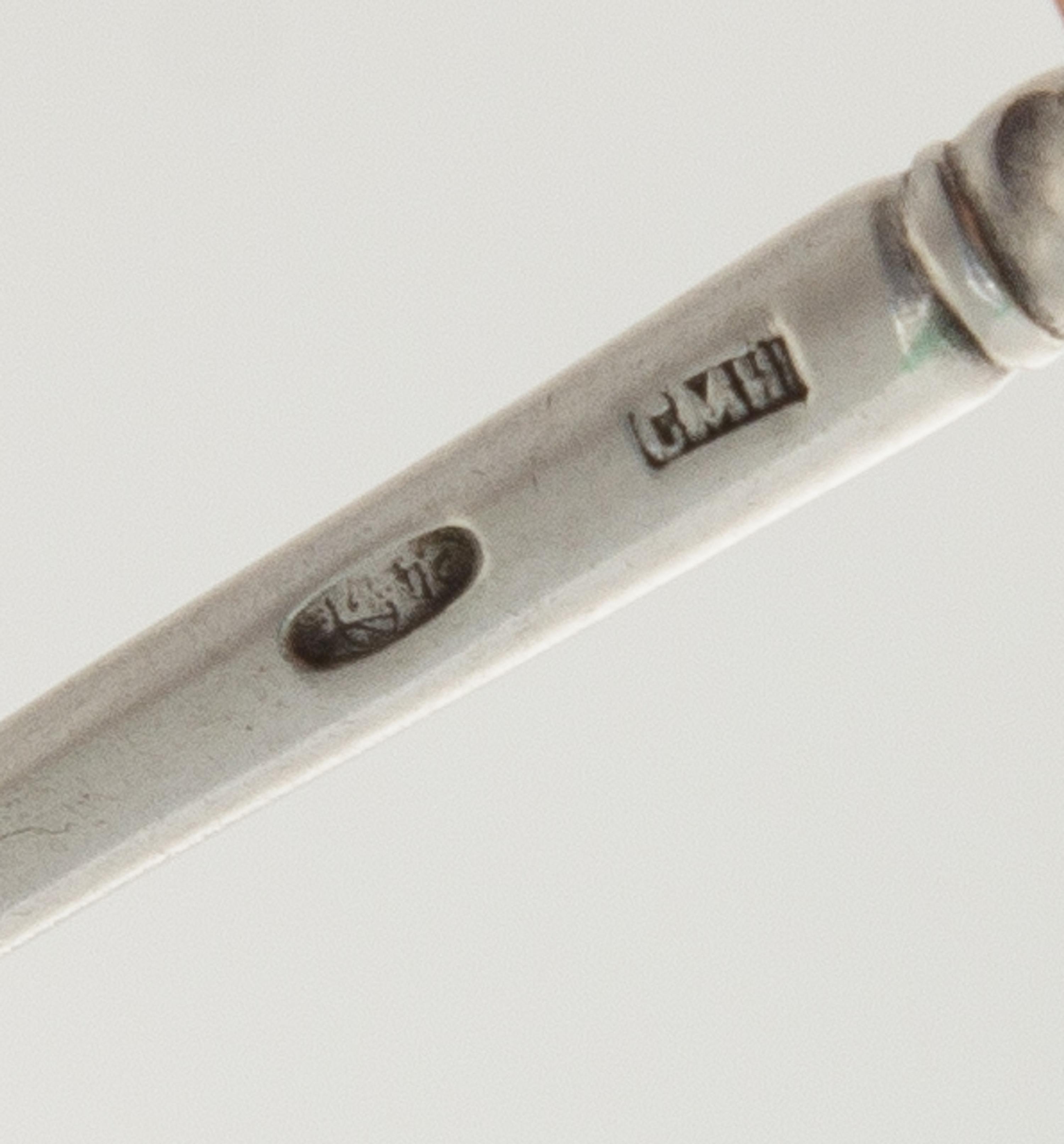 A Russian Niello Silver Spoon, Maker's Mark Cyrillic CMH, Moscow, having a knopped finial and a twist stem, the underside of the bowl h