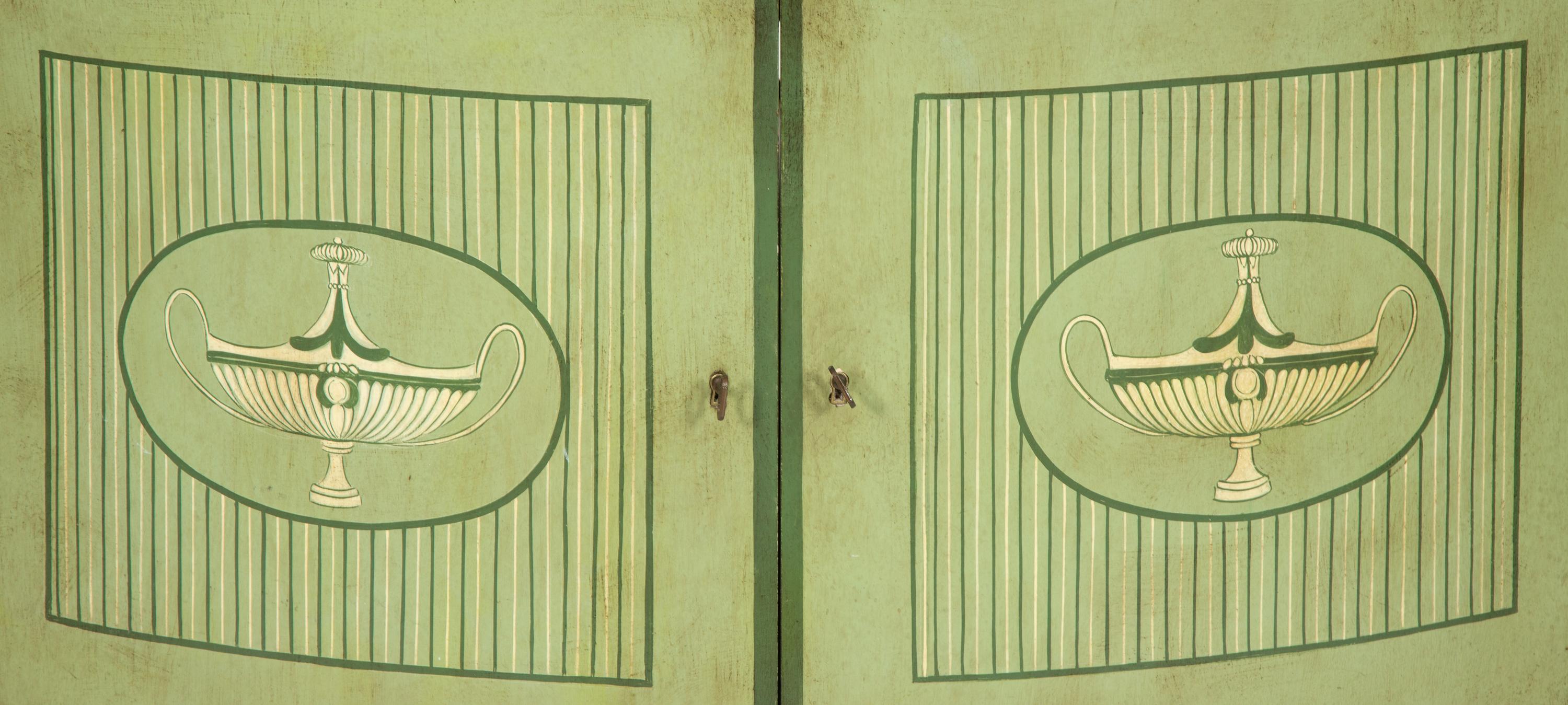 A Pair of Italian Neoclassical Style Painted Demilune Cabinets