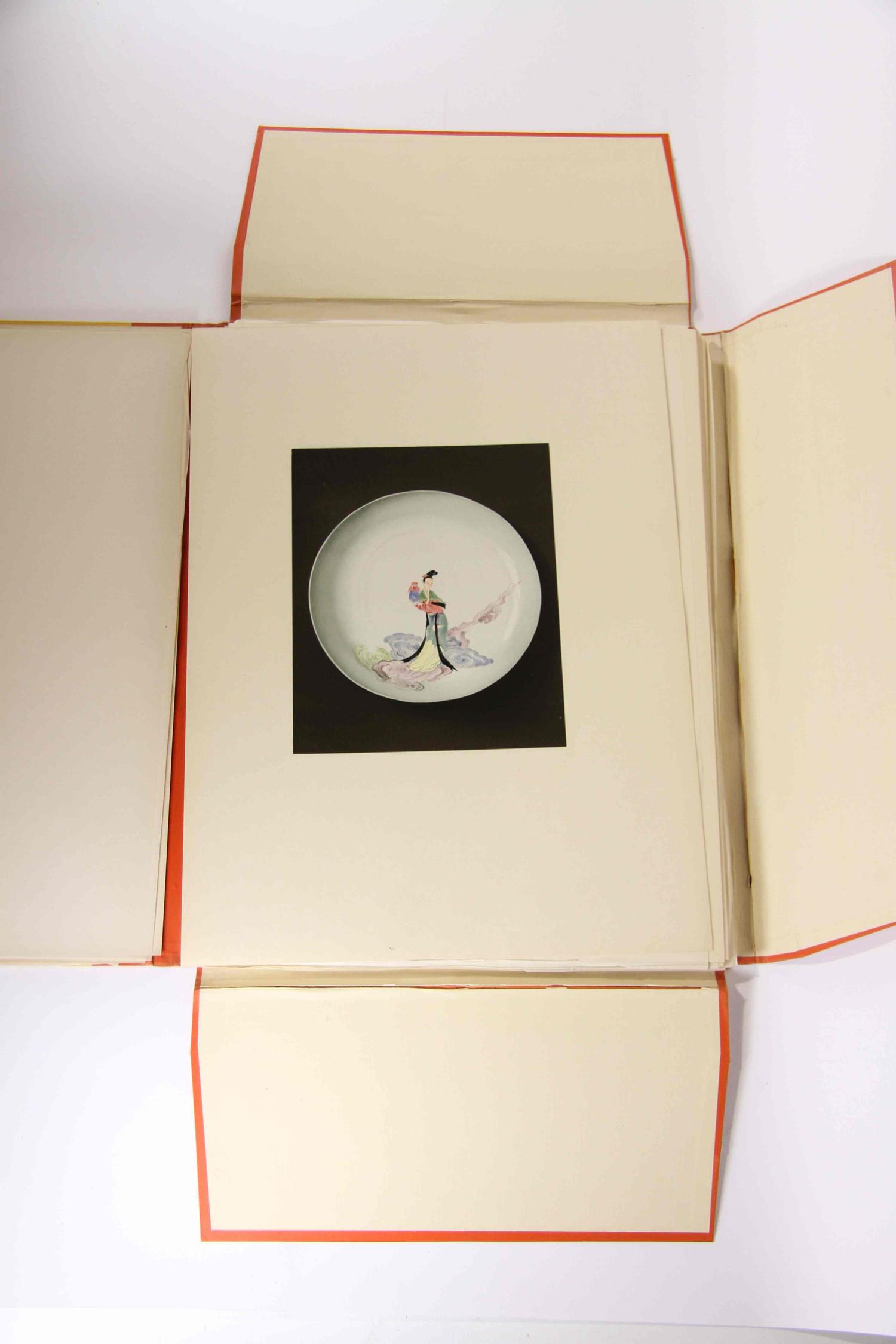 A Group of Four Ceramic Plates Height of tallest 22 1/2 inches.