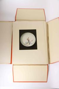A Group of Four Ceramic Plates Height of tallest 22 1/2 inches.