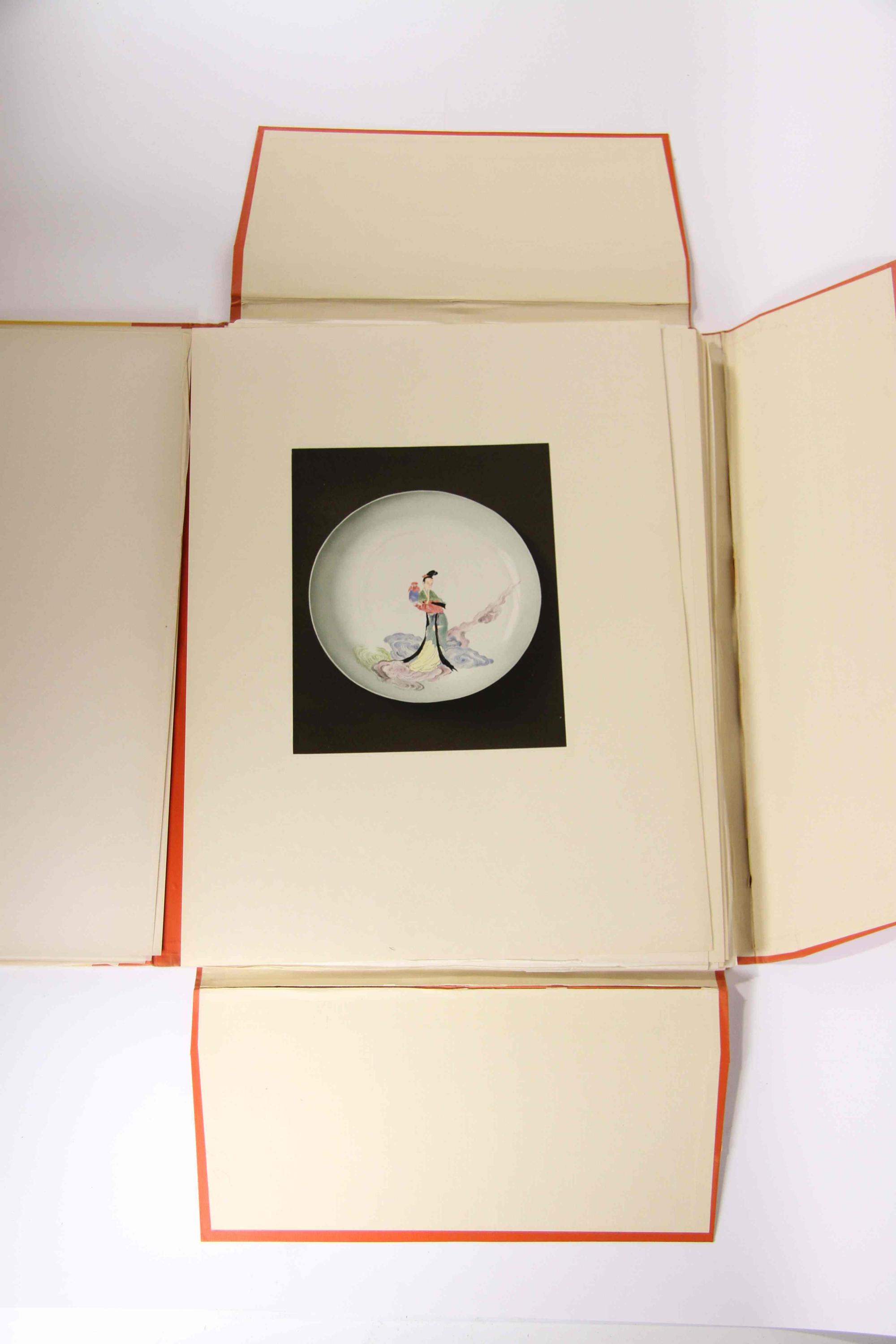 A Group of Four Ceramic Plates Height of tallest 22 1/2 inches.